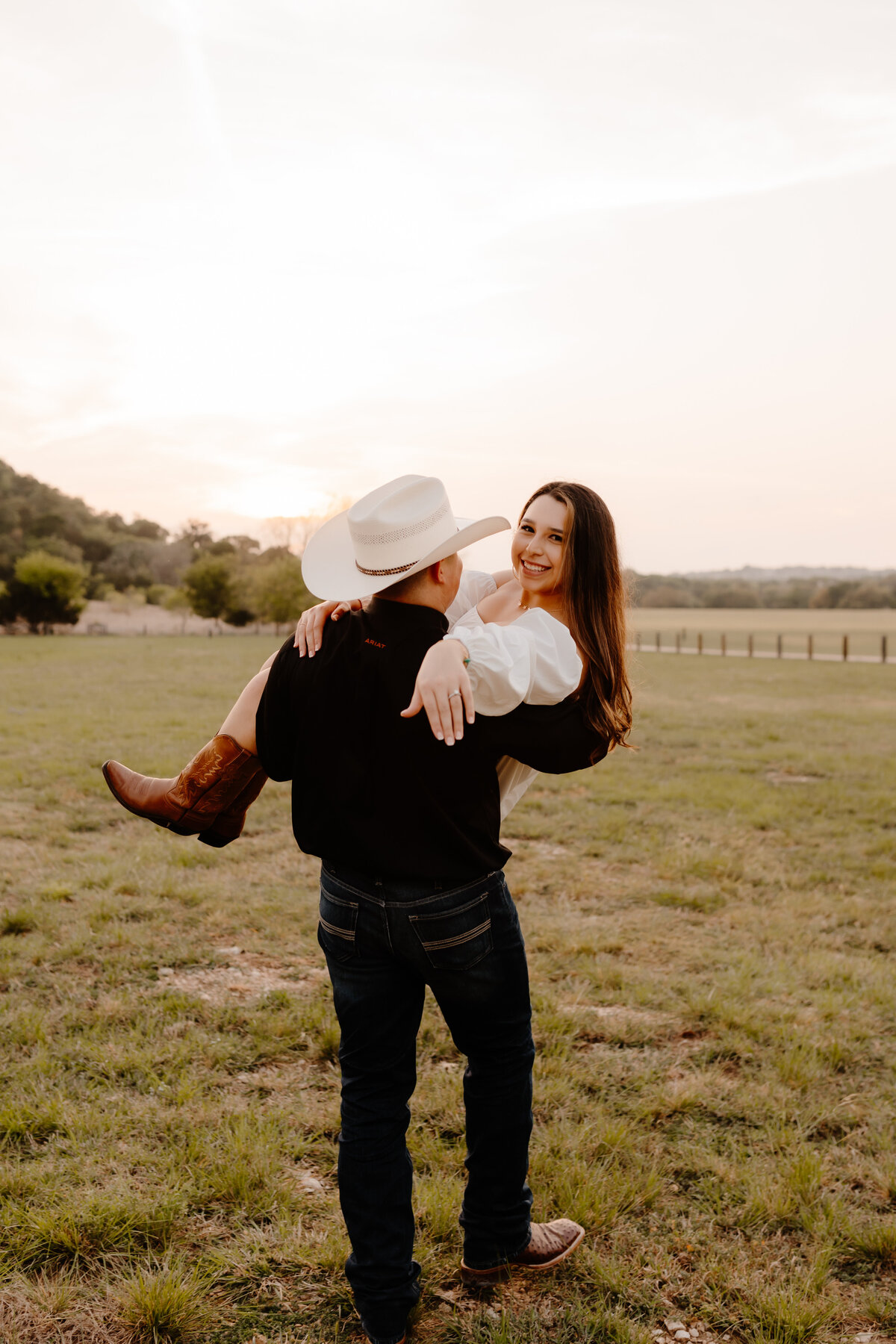 groom holding bride