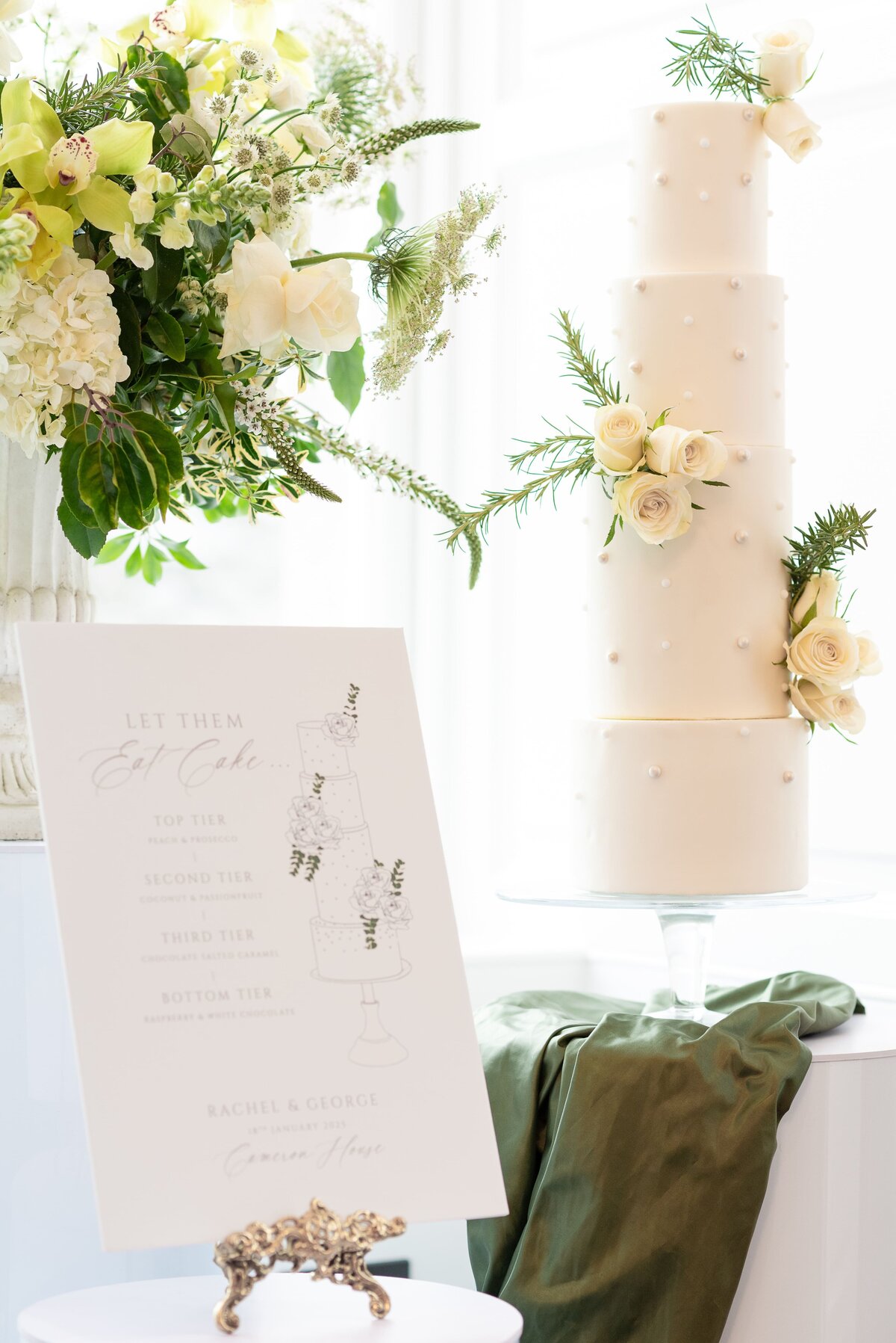 Beautifully decorated wedding cakes with white florals