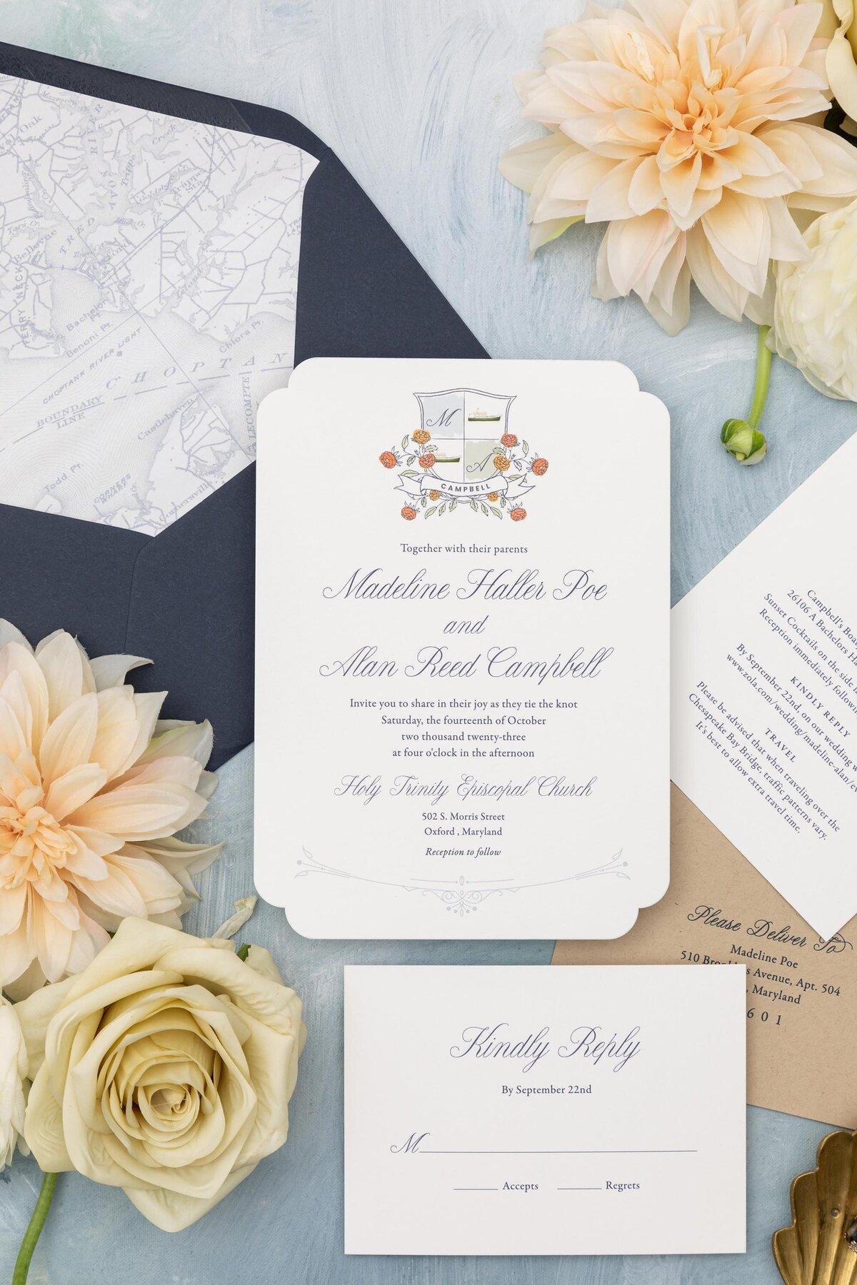 wedding invitation suite with navy blue and white detailing and nautical map
