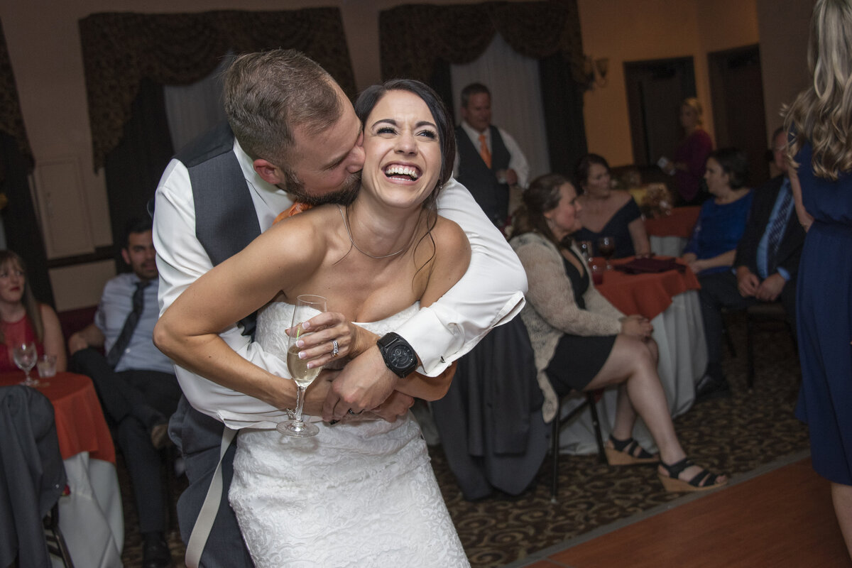 Couple laughing and dancing wedding reception The Lodge at Flat Rock Hendersonville, NC