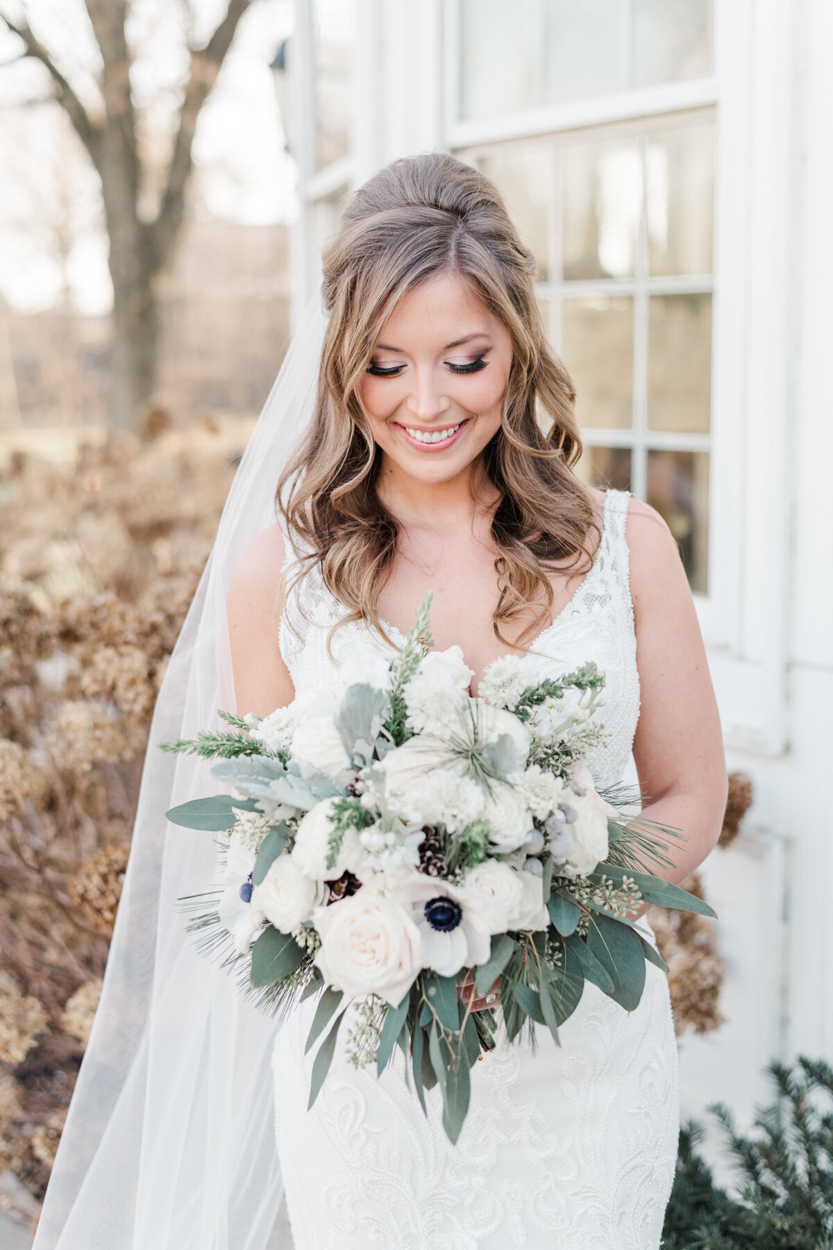 A bride poses for a portrait
