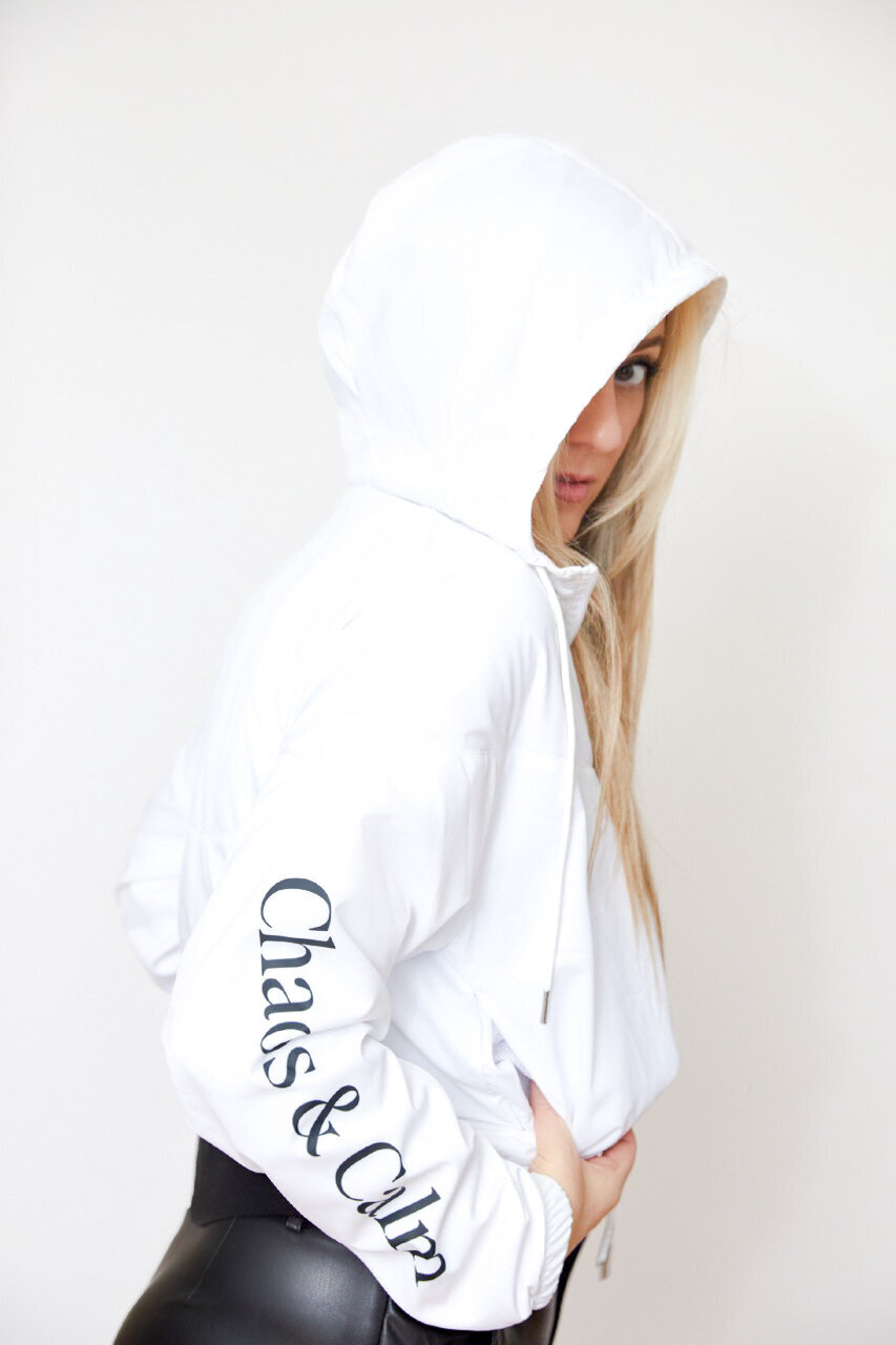 Georgiana wears the Chaos & Calm black and white cropped windbreaker I Merch Shoppe I Chaos  & Calm