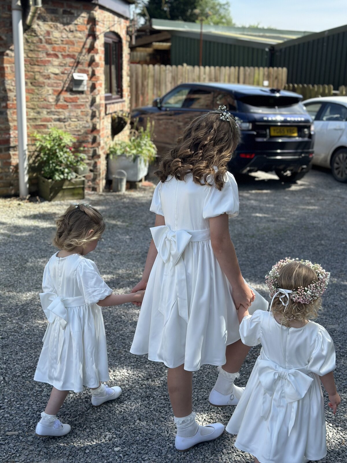 Close detail of the flower girls