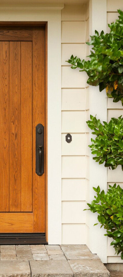 Spanish Modern Front Door with Coral Paint