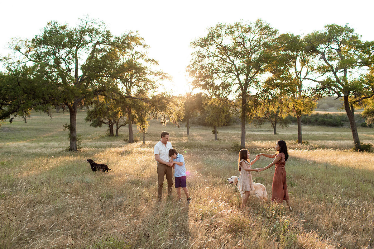 Family portrait in gorgeous outdoor lighting - Sara James photography creates stunning family images with optimal natural illumination during professional sessions in San Antonio Texas locations