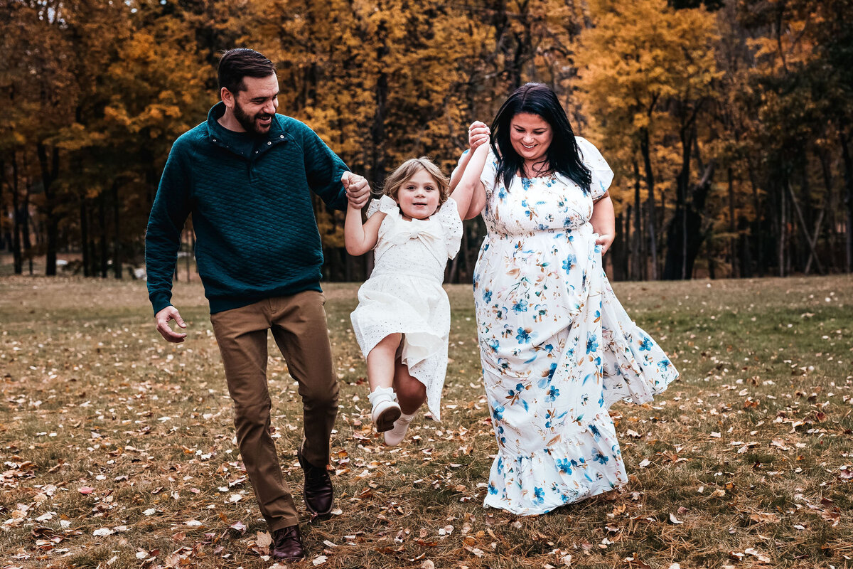 Family walking at Stark Park in Manchester NH by lisa smith photography