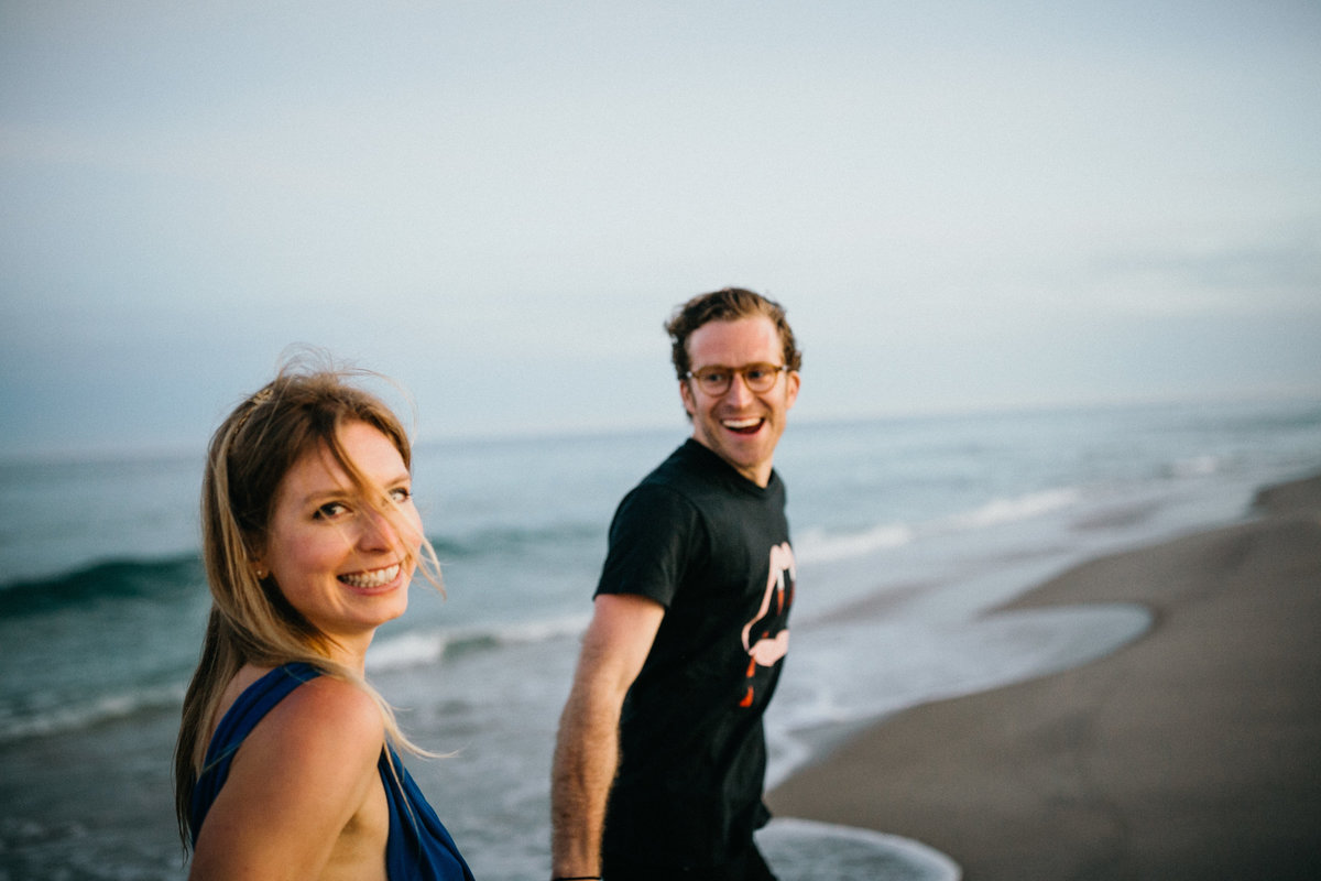 Natural light engagement session on Long Island beach, photographed by Sweetwater.