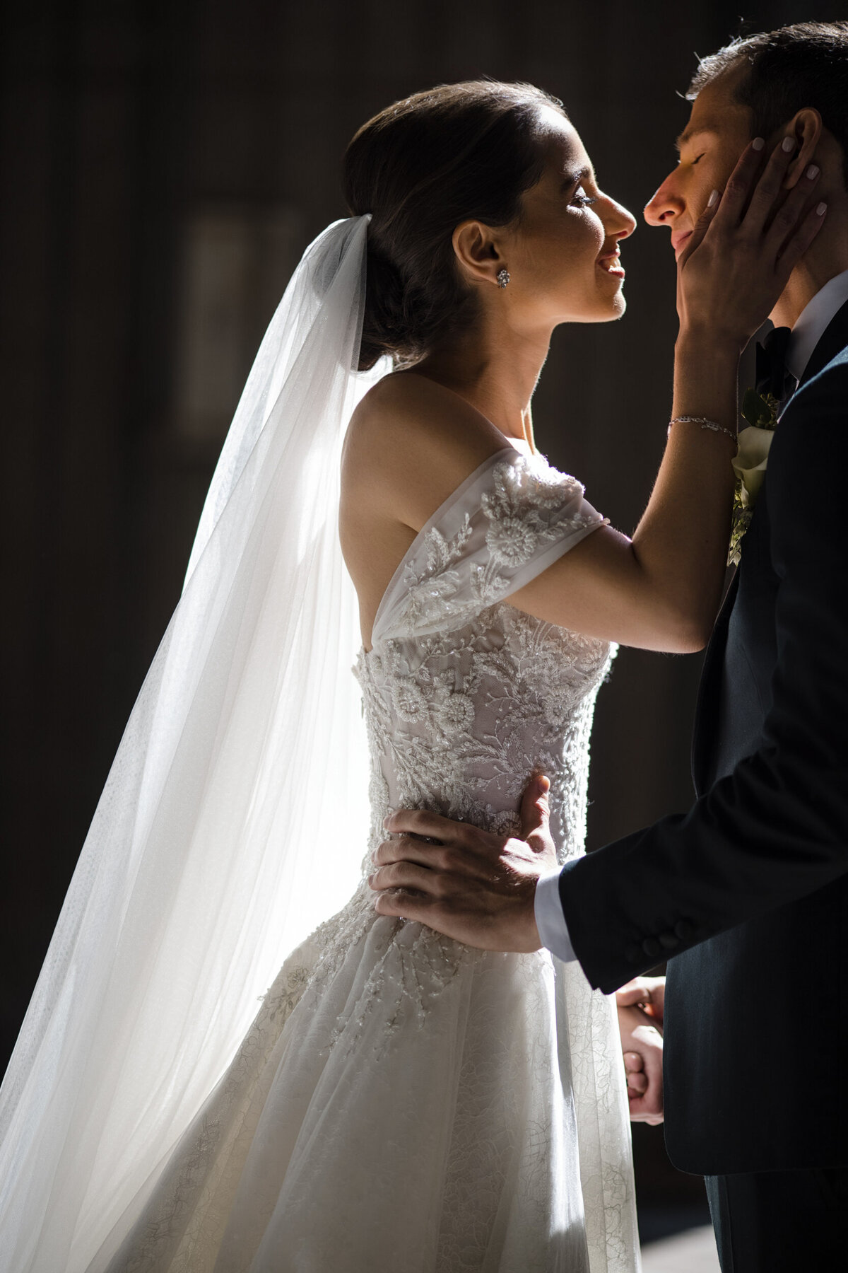 A bride and groom share a kiss  at a Beekman Hotel wedding