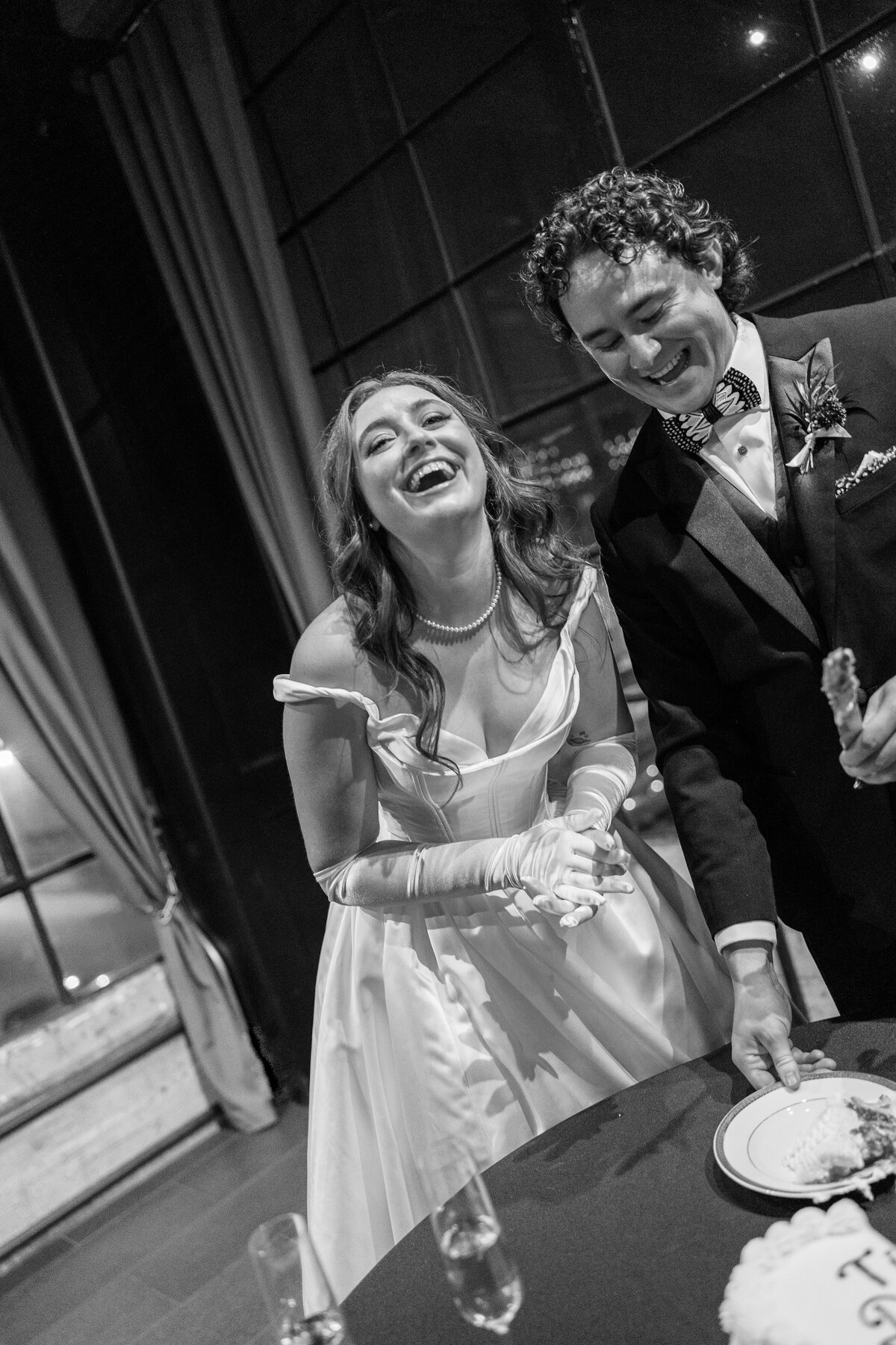 A photo of the bride and groom during the reception  at their Astorian wedding in Houston.