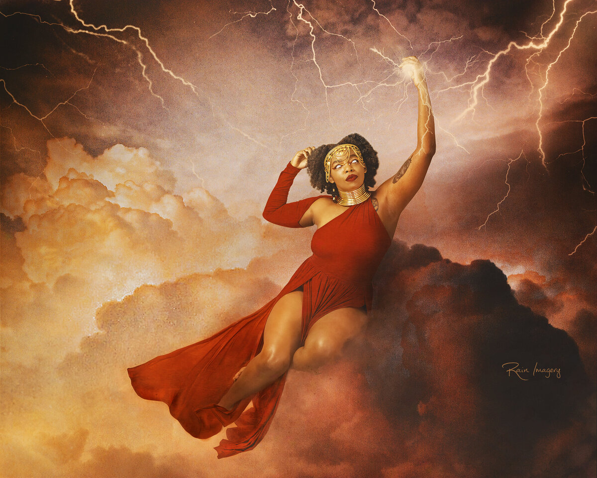 Fantasy Photo Art of a woman in the clouds wielding lightning.