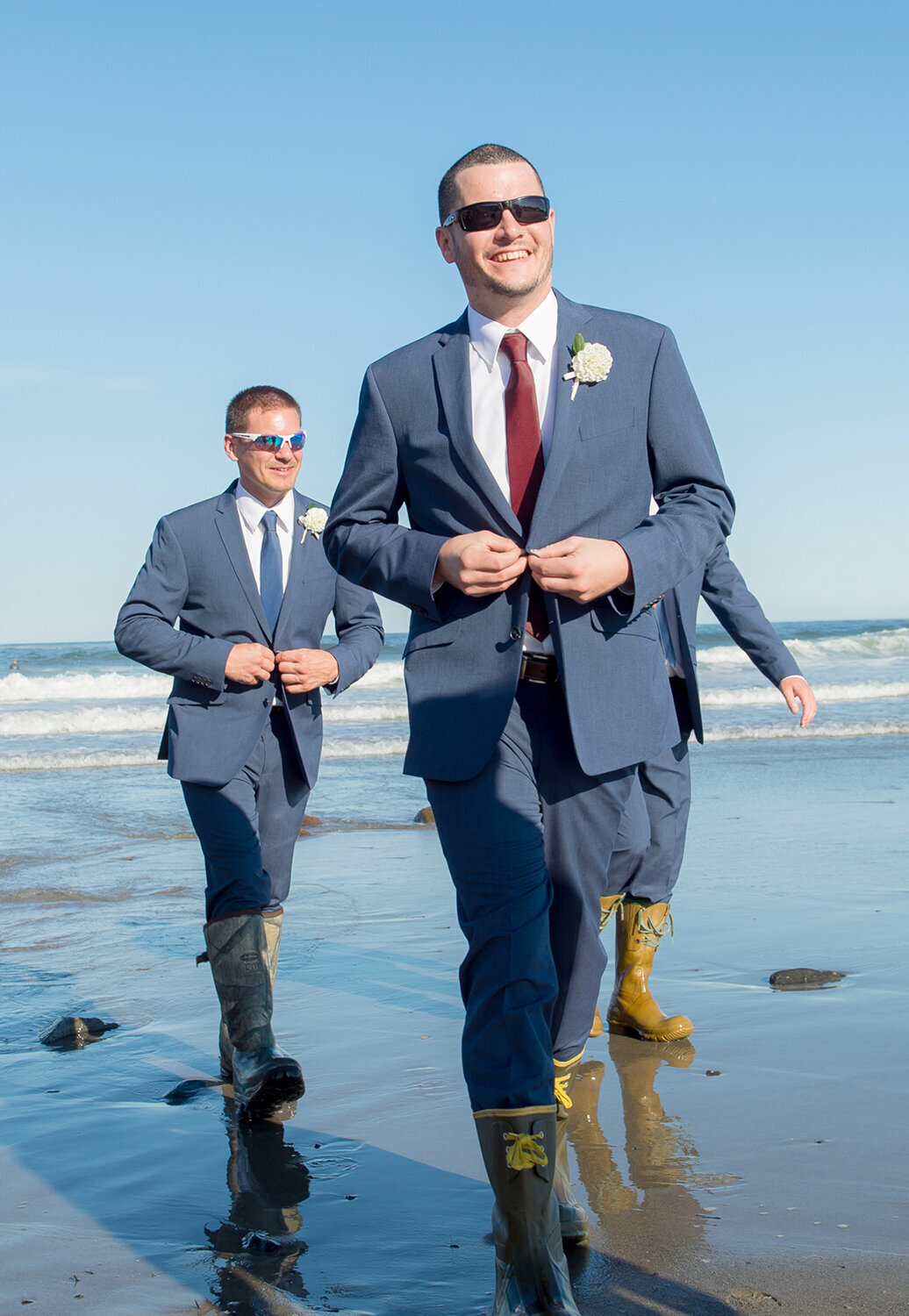 Groom at short sands beach in York Beach Maine on his wedding day