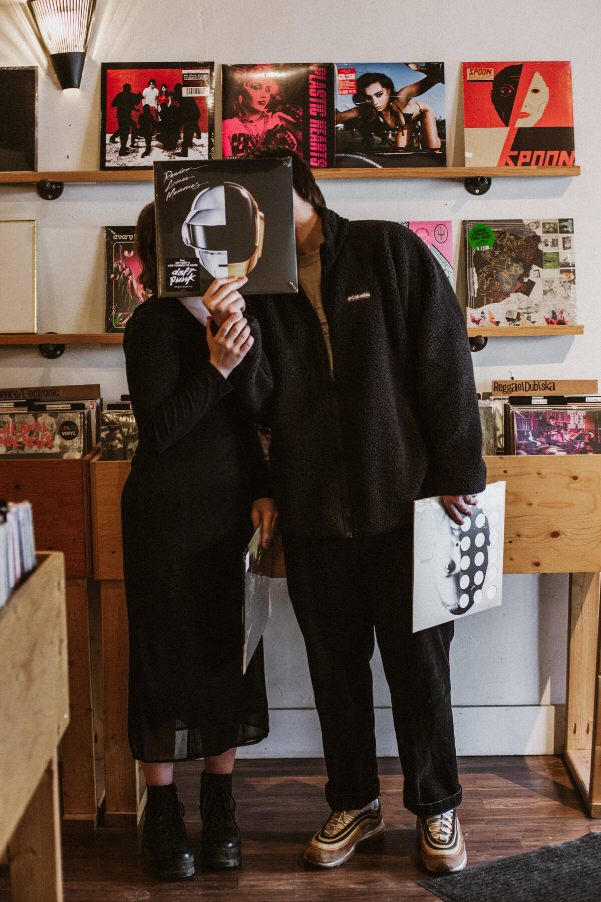 alternative couple photo session in record store Ontario