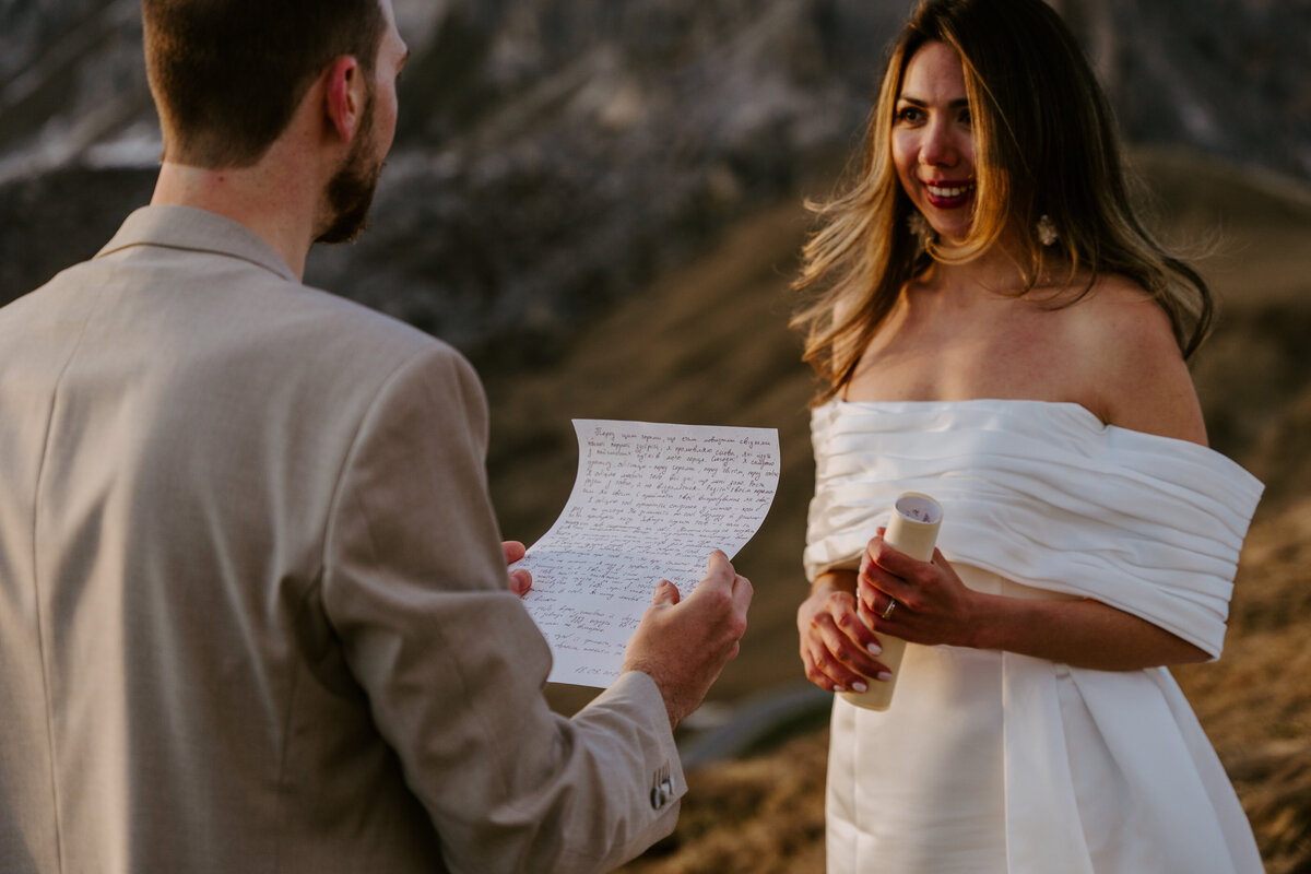 happy couple together in mountain elopement in Dolomites