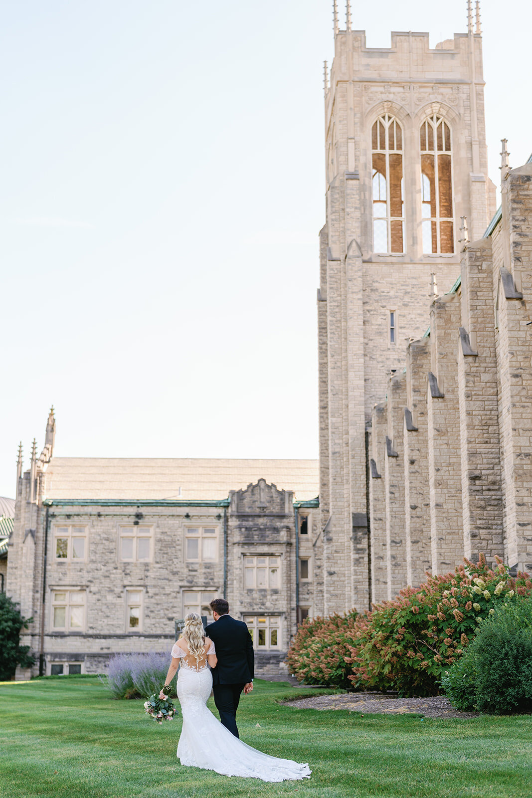 Bride and groom pictures outside of Memorial Presbyterian Church in St. Louis