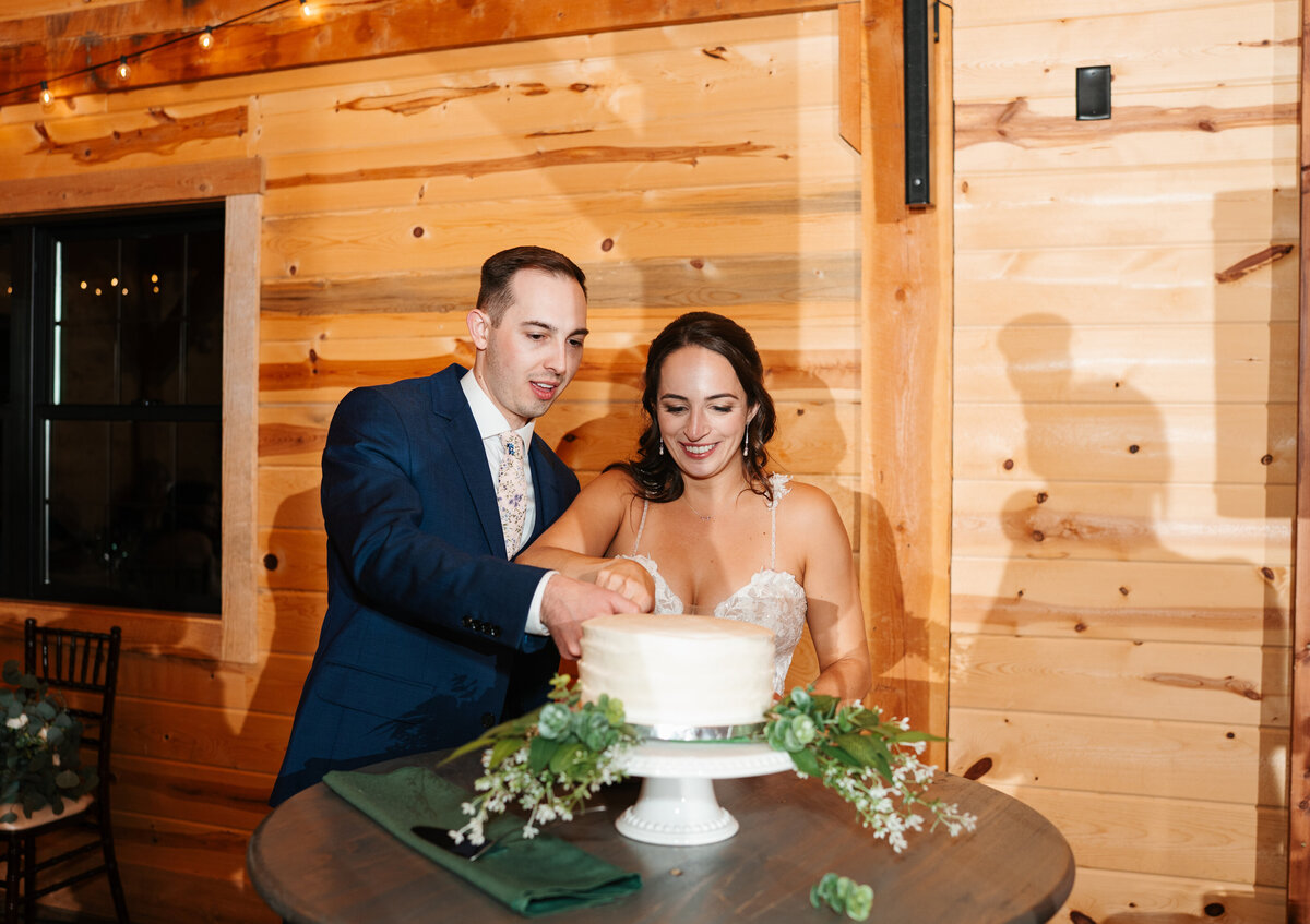 Reception decor featuring rustic charm and romantic candlelight