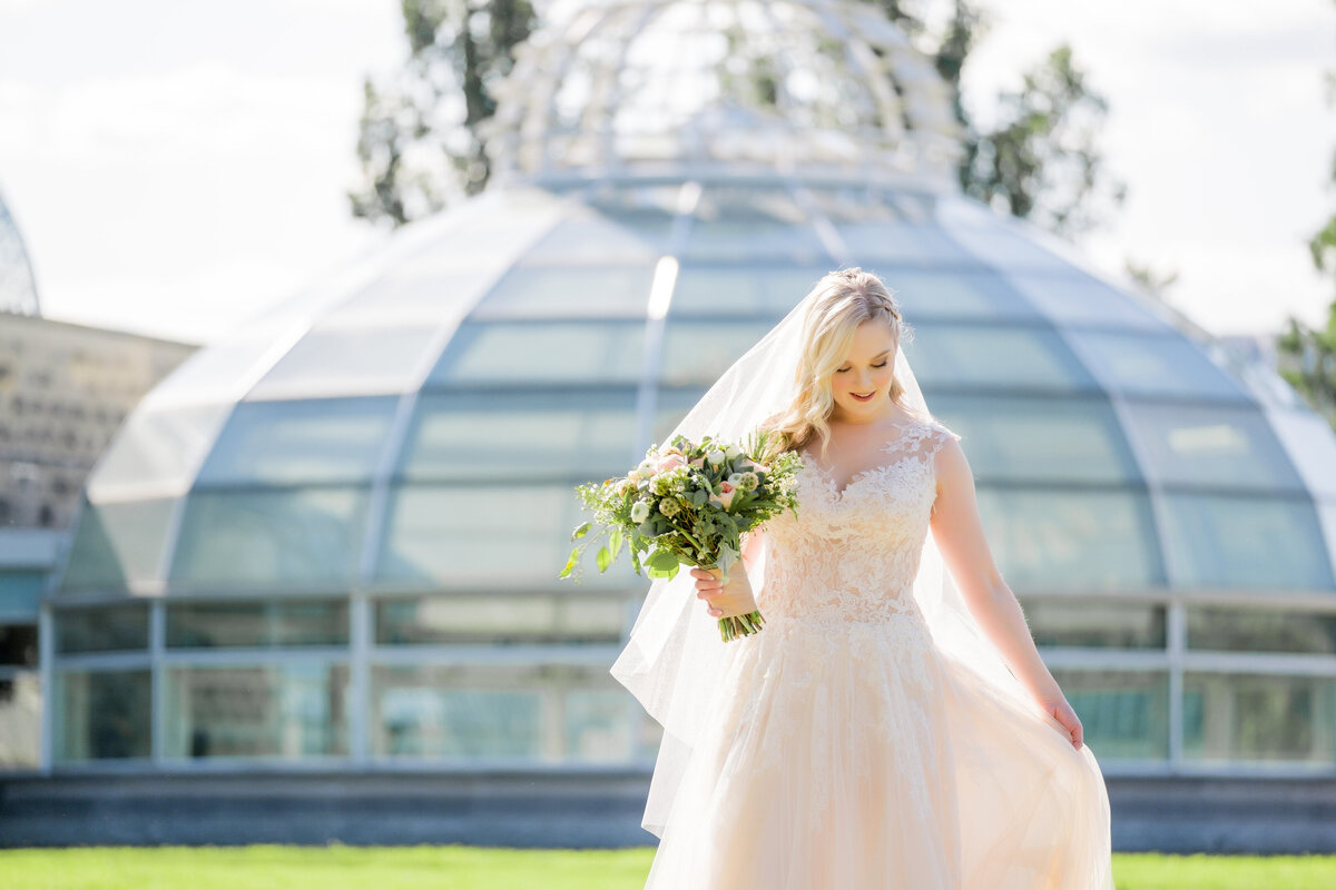 wedding photo of bride outside of phipps conservatory