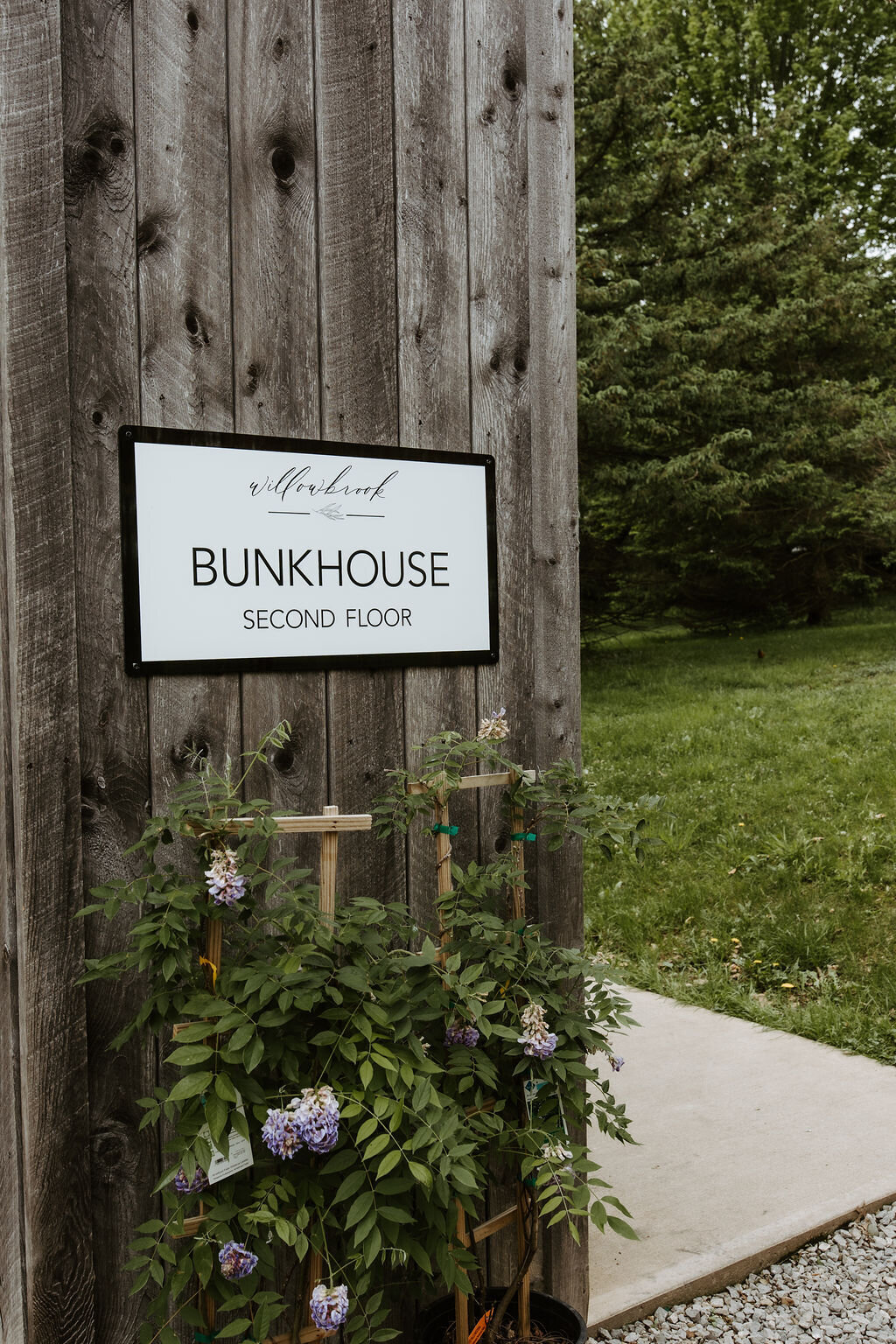 image of the black and white Bunkhouse sign at Willowbrook wedding venue in Pittsburgh