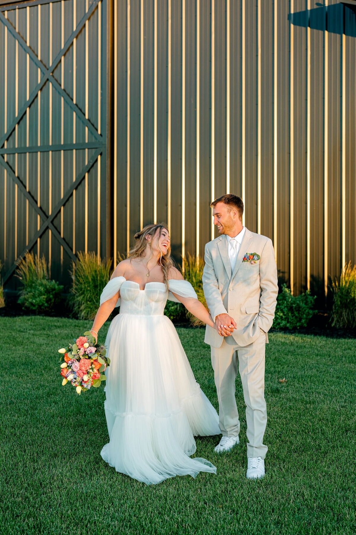 ride_Groom_Holding_Hands_Laughing