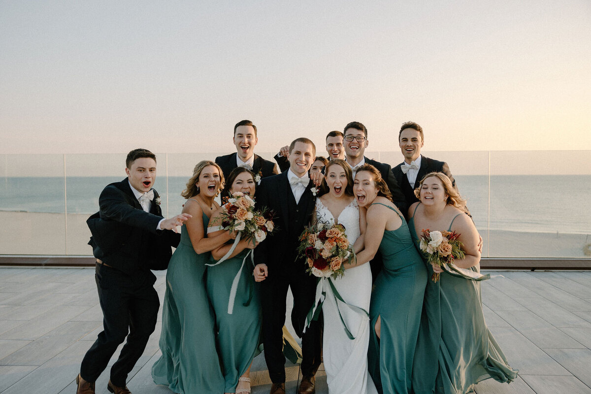 wedding party hugging