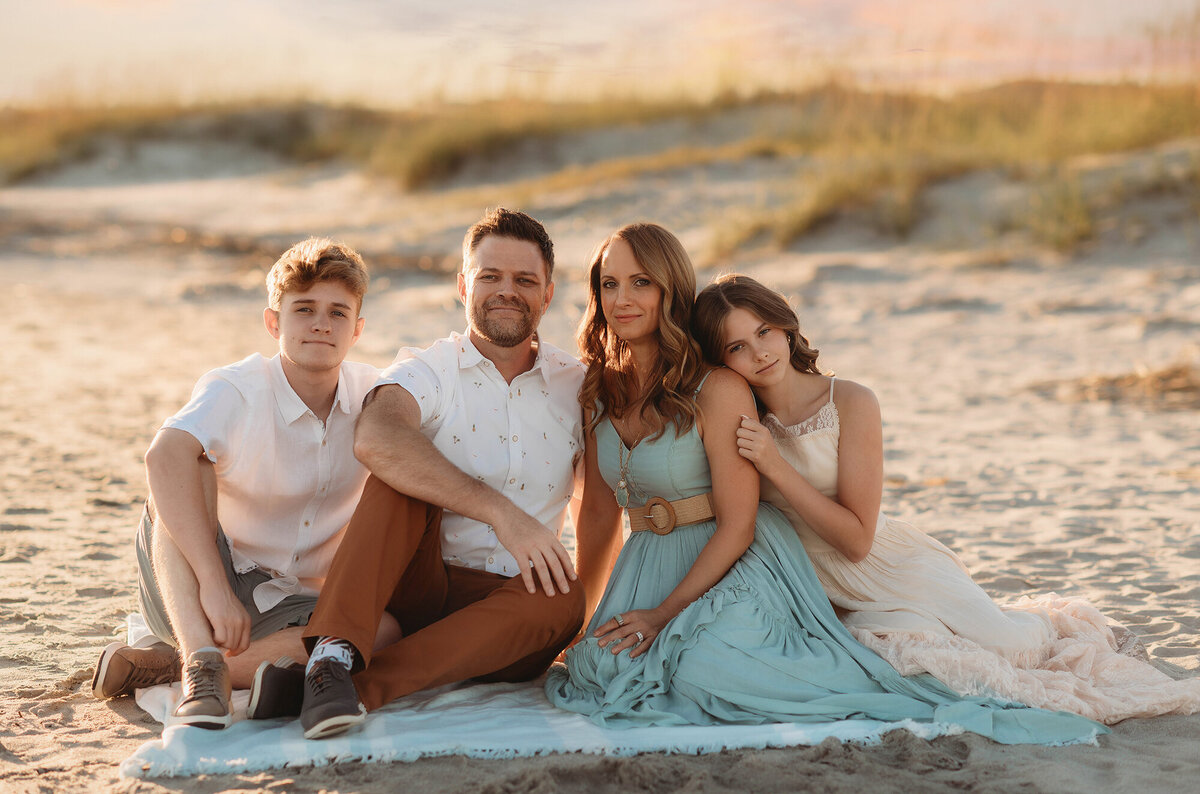 Family poses for Beach Photos in Isle of Palms.