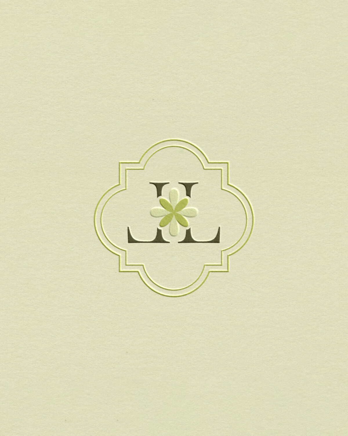 Timeless monogram logo with floral detail and soft green tones, perfect for garden brands seeking refined, organic branding.