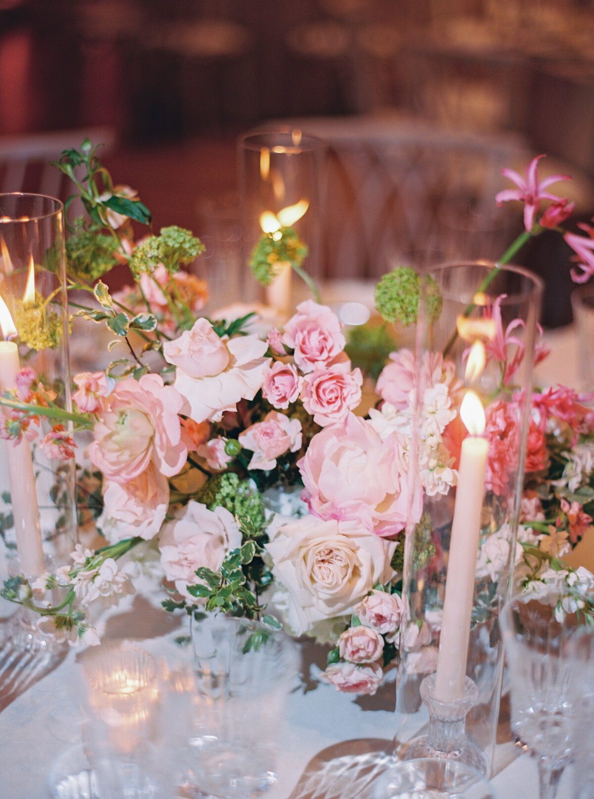 Elegant-Colorful-reception-flowers-pillar-candles
