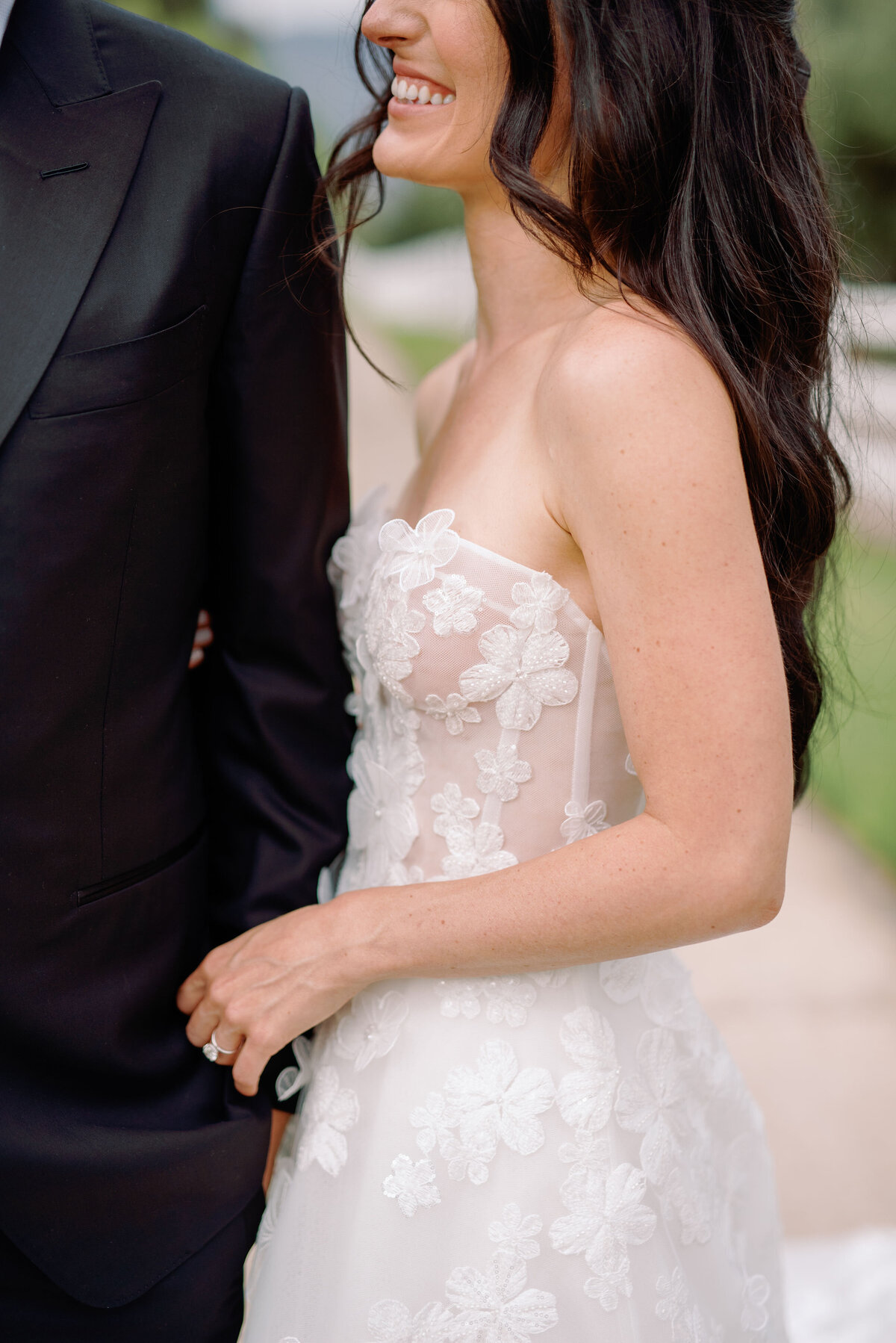 Bride in beautiful white dress and groom in black tux on their wedding day in Ojai Valley California