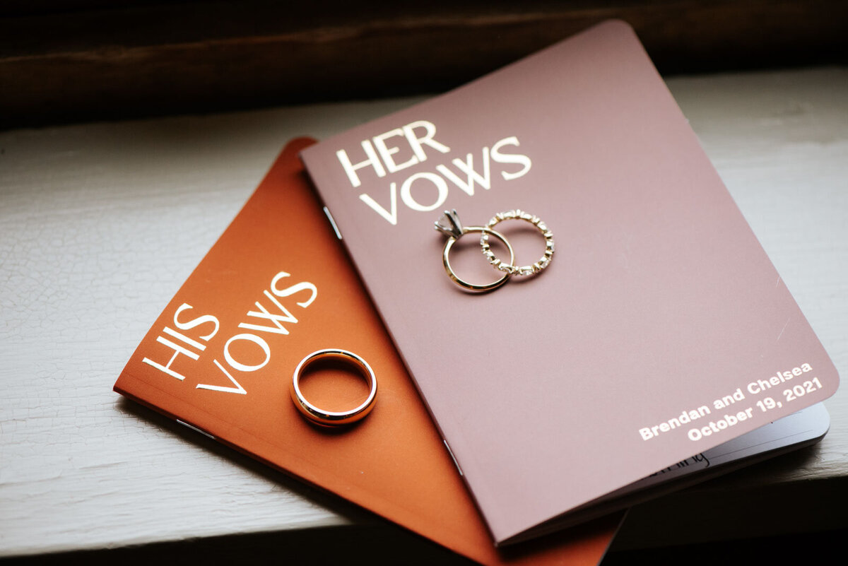 vow books with wedding band engagement rings mountain top inn vermont
