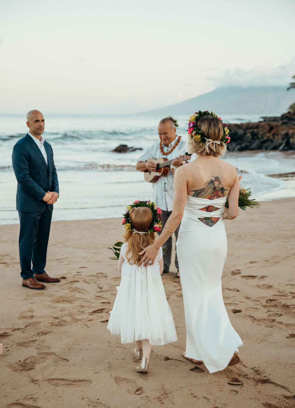 Maui Wedding Photographer captures bride walking down aisle on beach