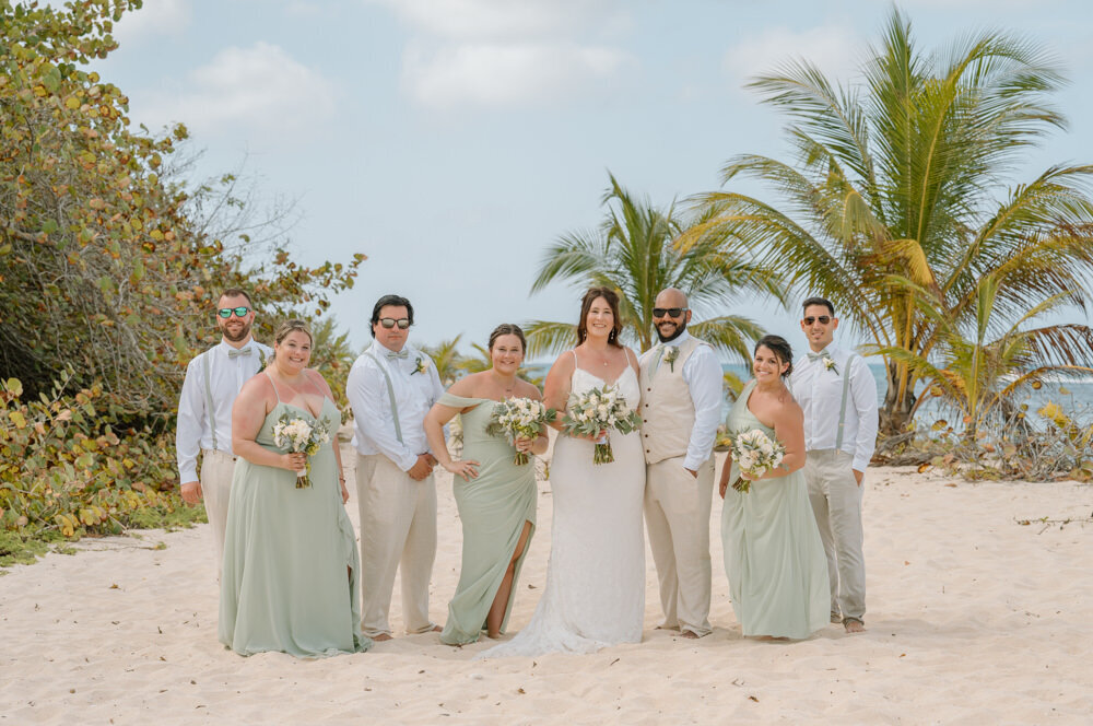 a wedding party on the beach in Cozumel
