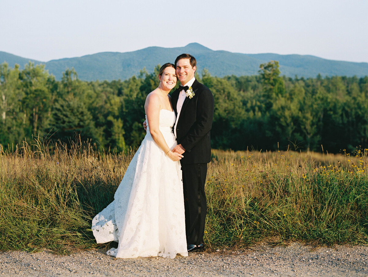 bride and groom with mountain views
