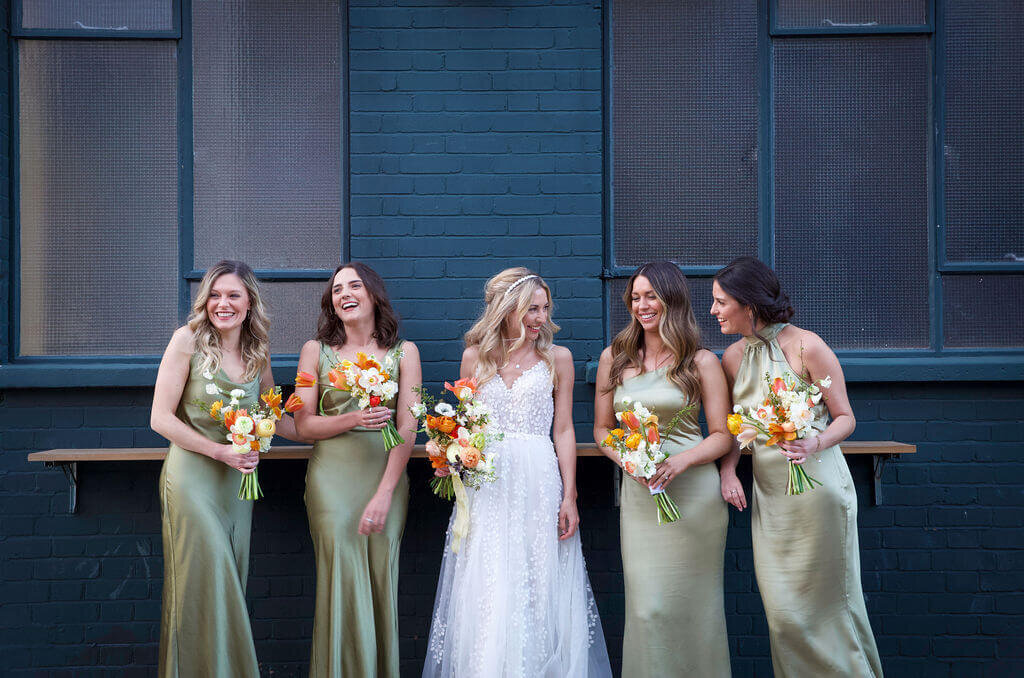 Bride and bridesmaids outside the Hackney Co.