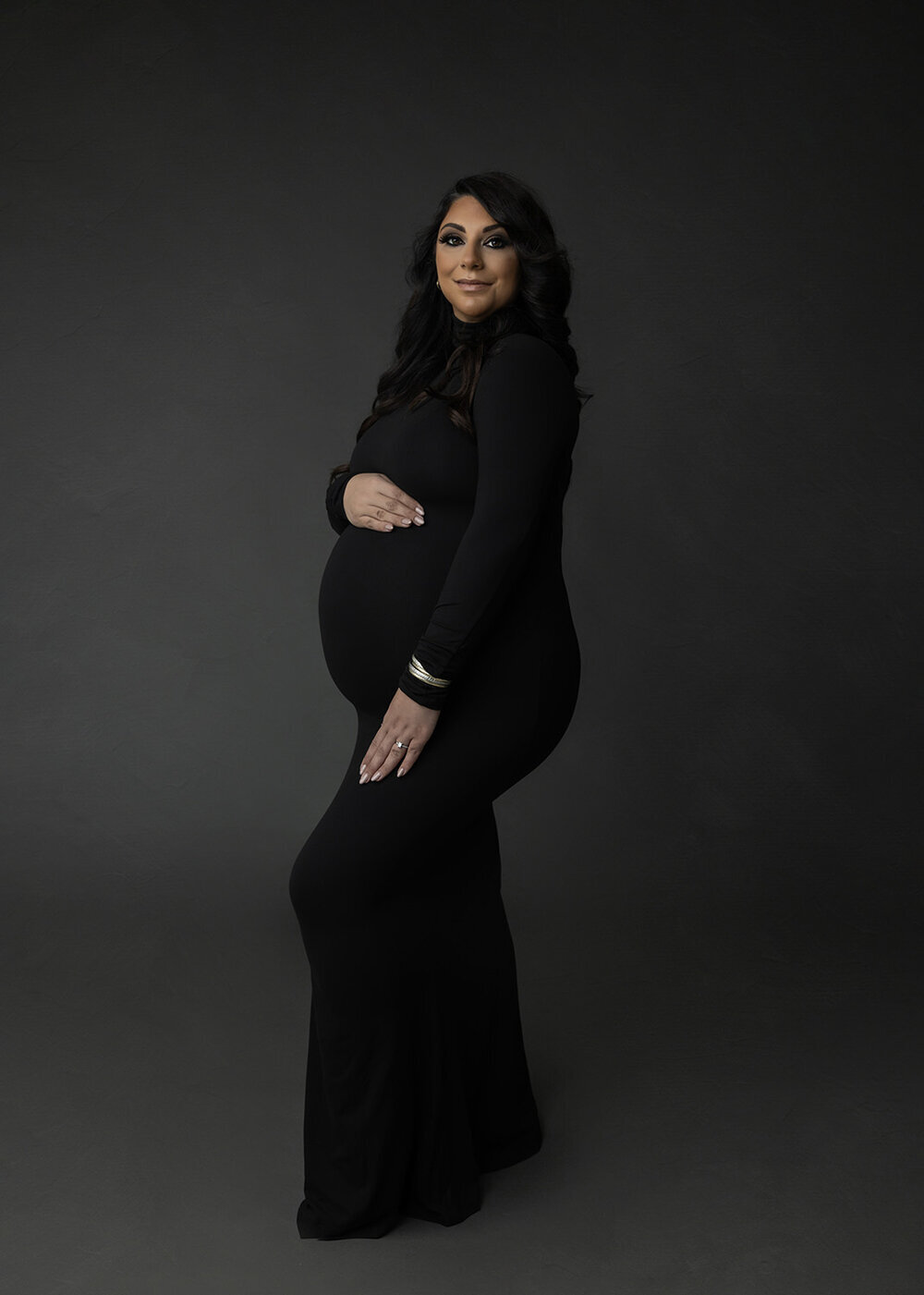 MATERNITY_PREGNANTWOMANINBLACKDRESS1
