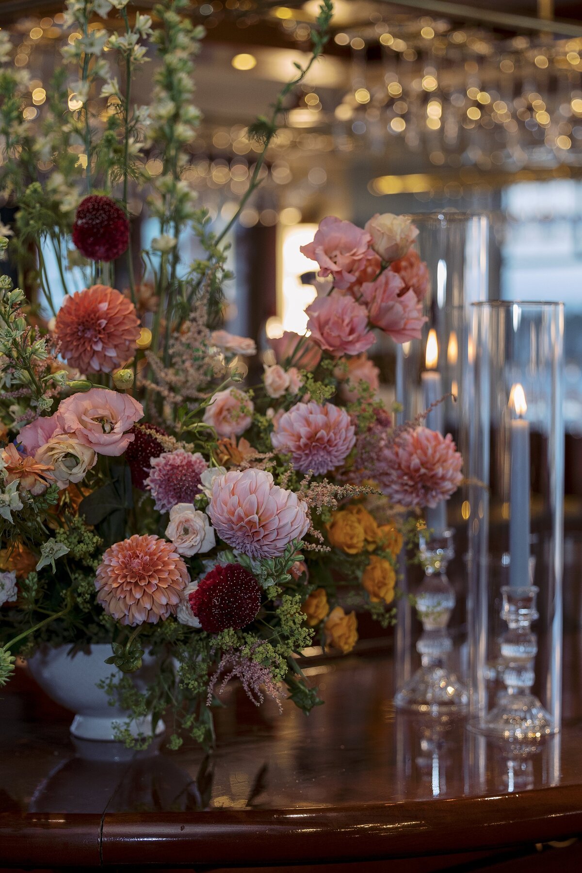 Wedding reception floral decor on bar top at the Corinthian Yacht Club.