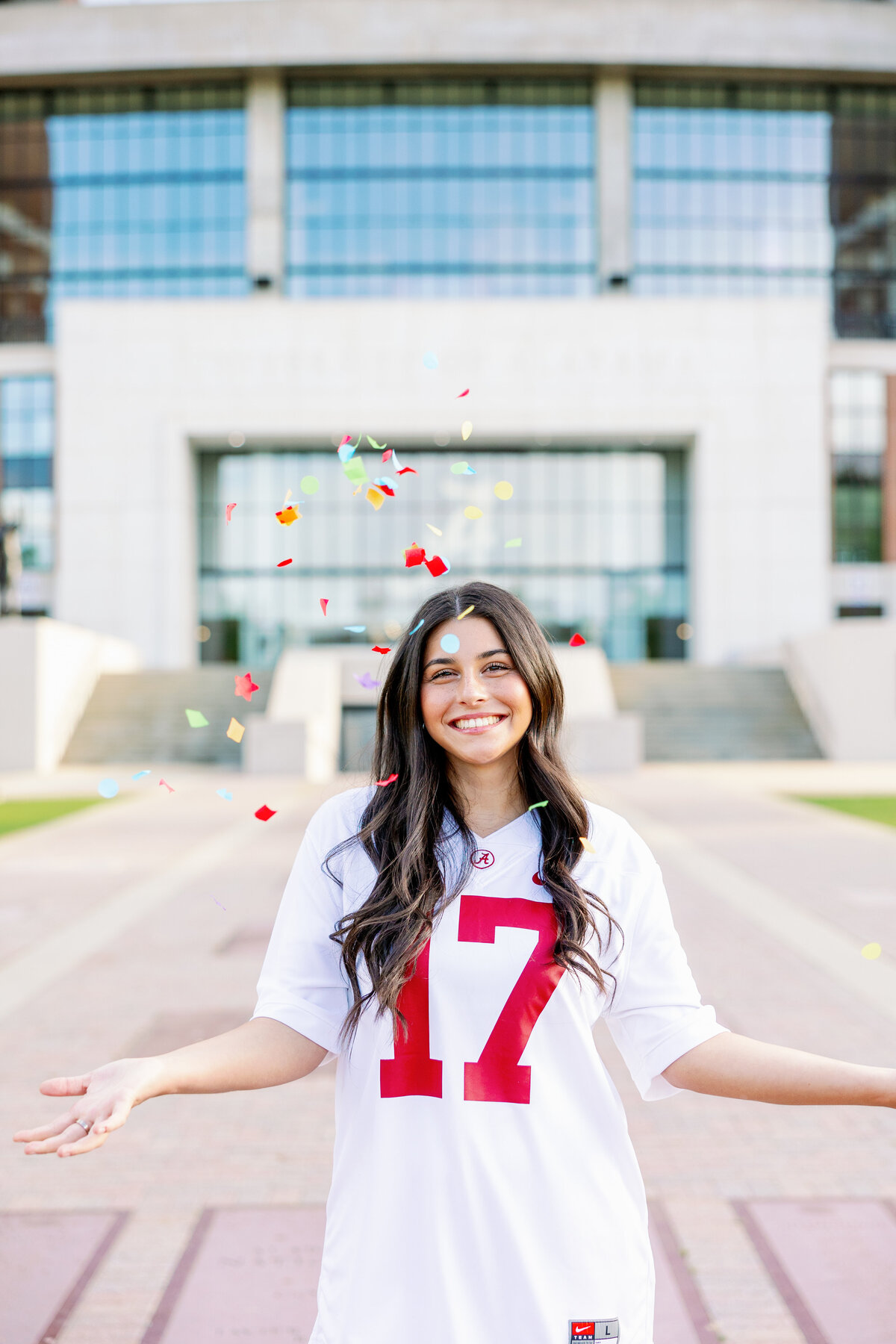 Confetti popper on the walk of champions for grad photos at the university of alabama