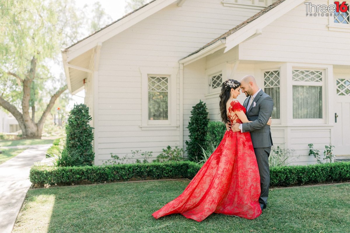 Newly married couple embrace one another at the Richard Nixon Library Birth House