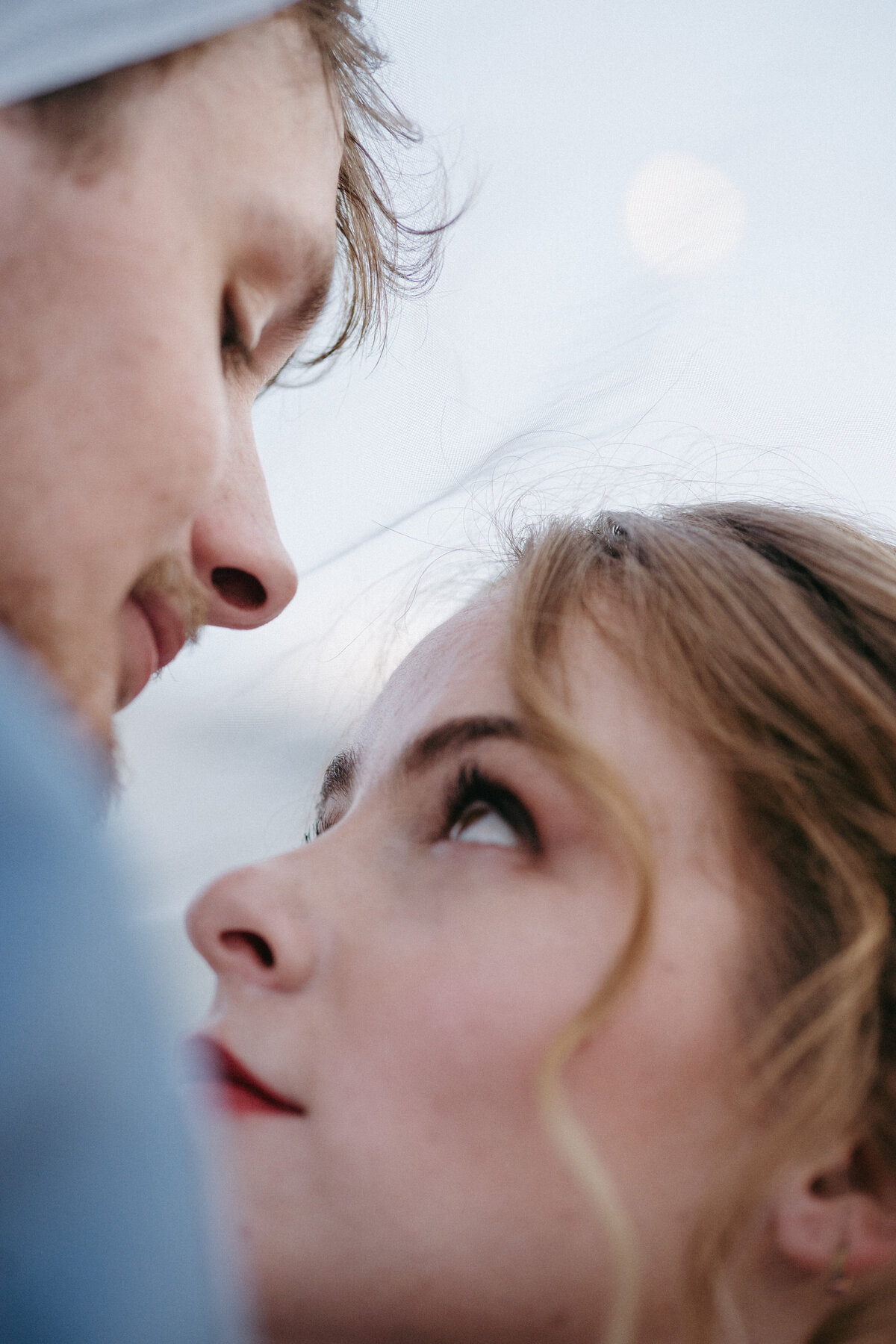 Couple gaze into each others eyes after wedding