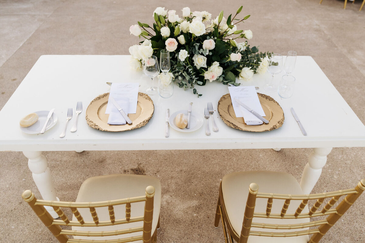 Table set up for the bride and groom on their wedding reception