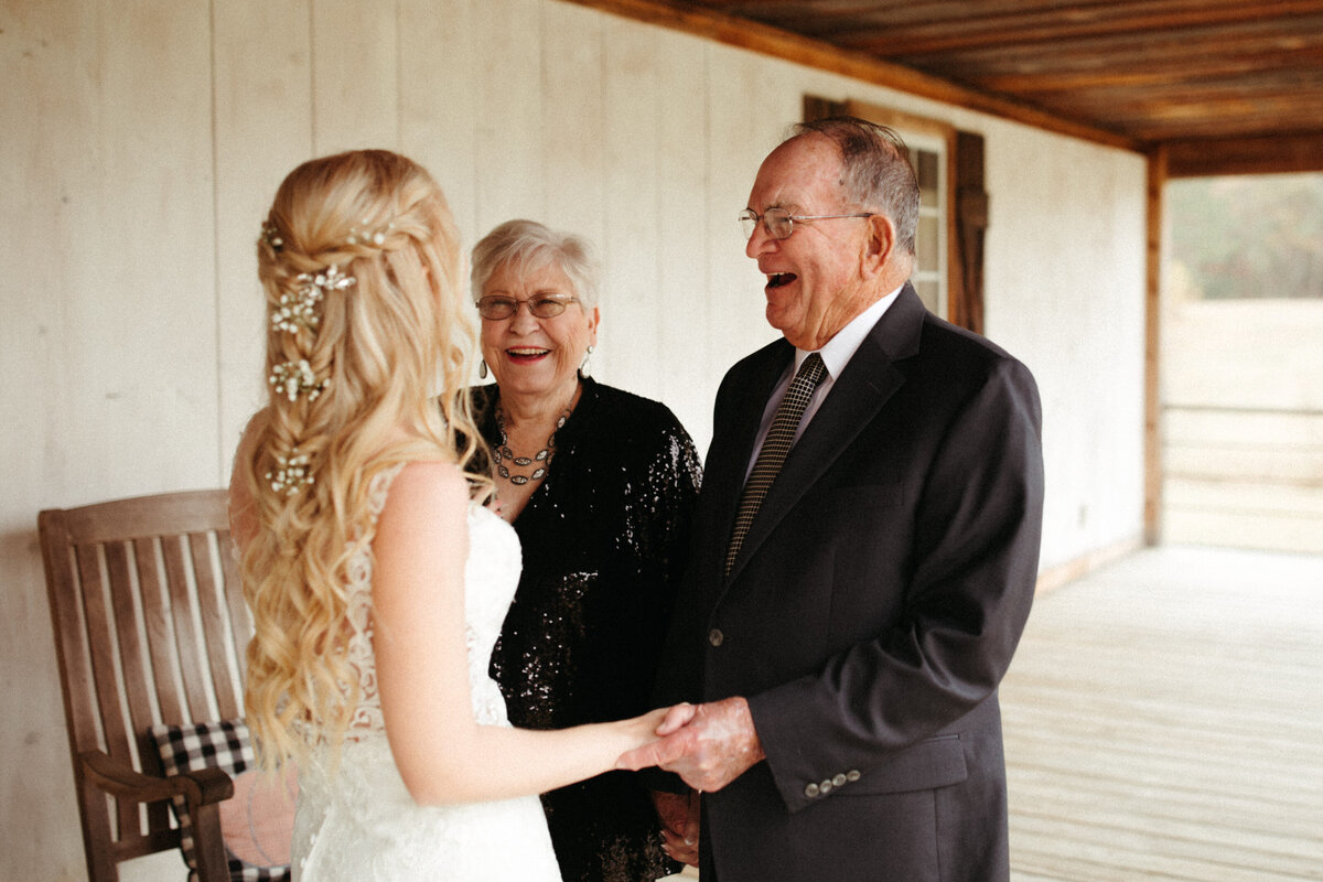 tupelo-mississippi-ms-the-antler-wedding-venue-bride-first-look-with-grandparents