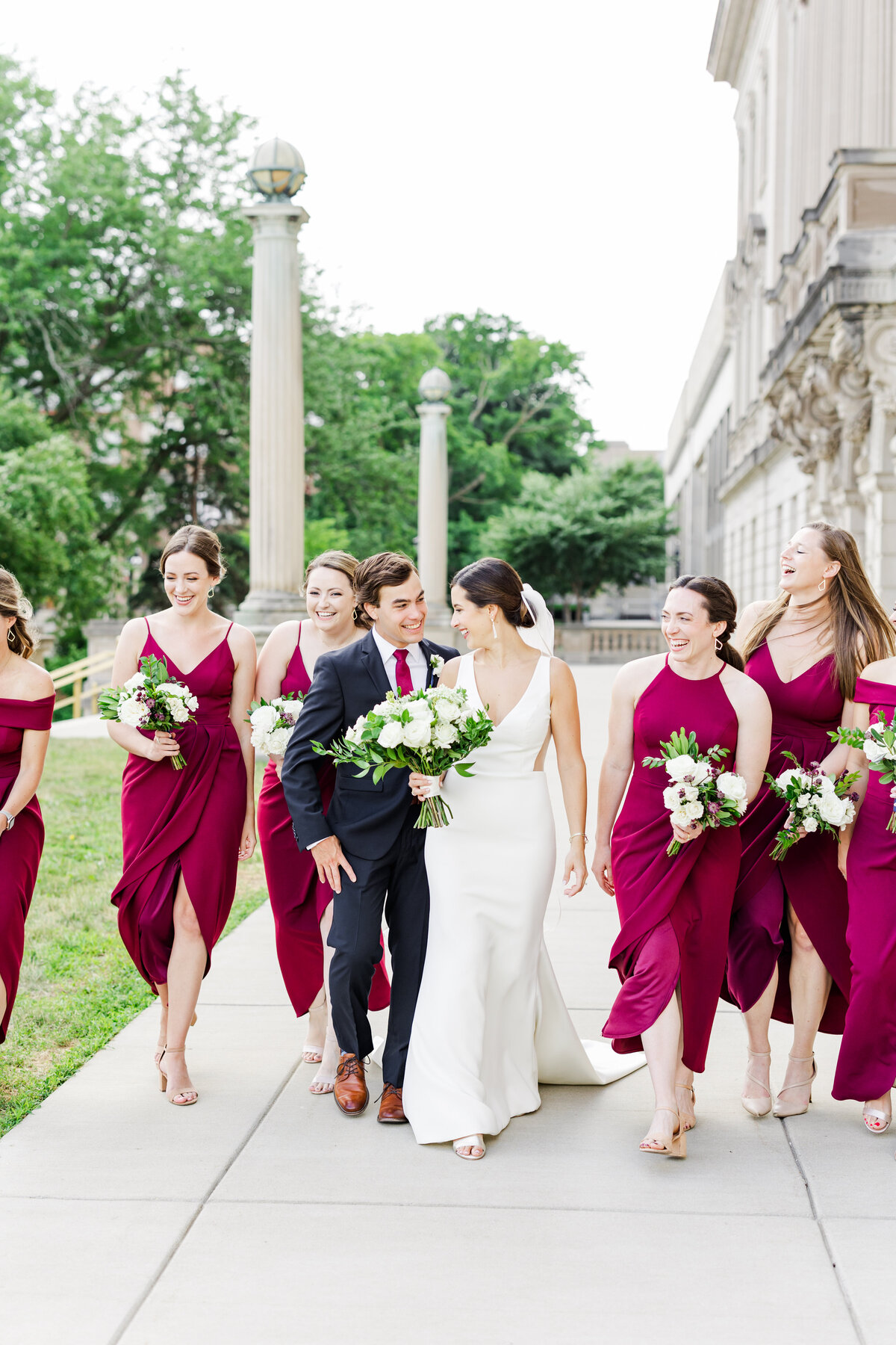 23_wedding_party_walking_and_laughing_bhld_bridesmaid_dresses