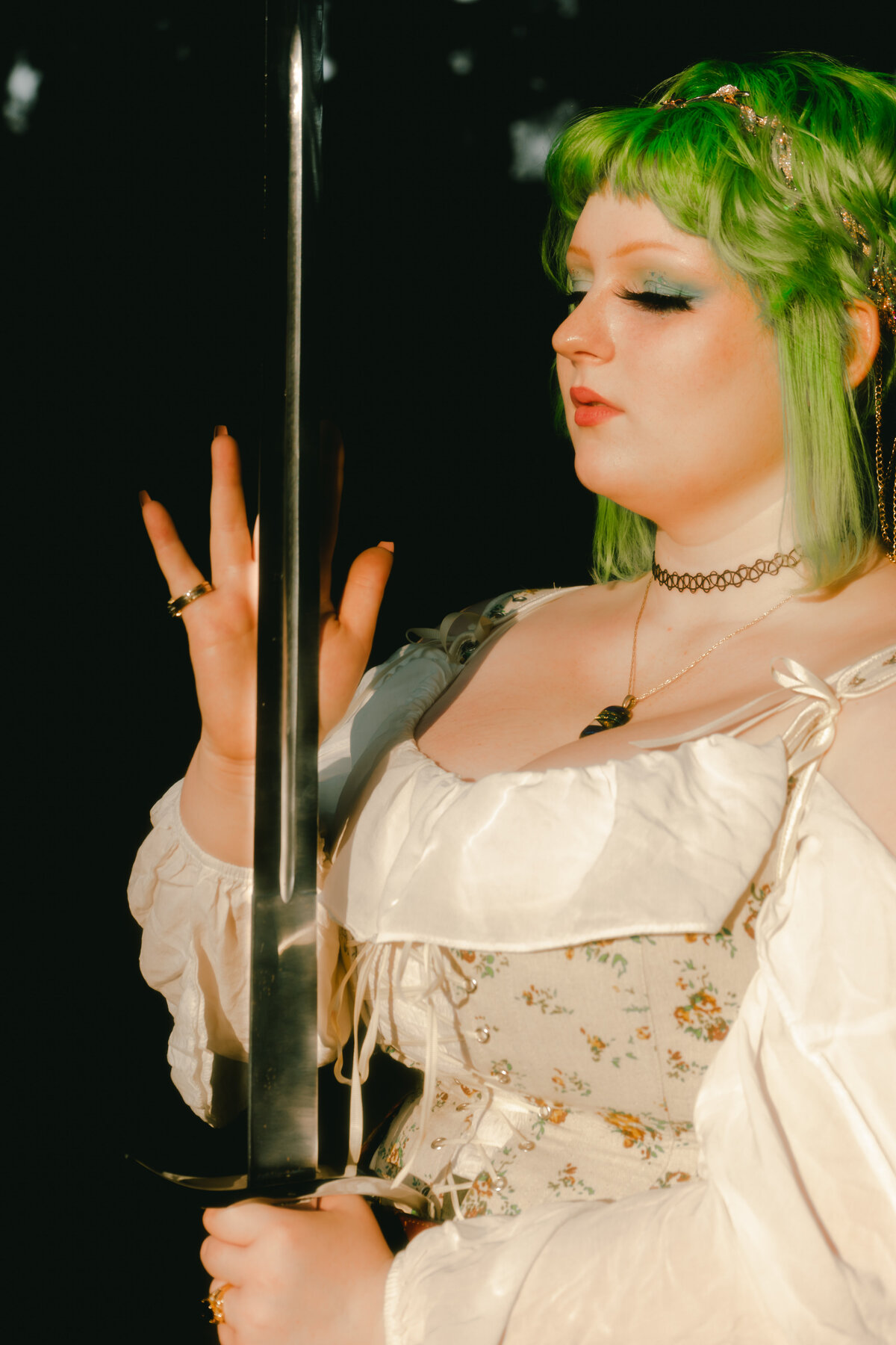 Artist with green hair posing near nature – expressive and unique personal branding image by Mewphotovideo