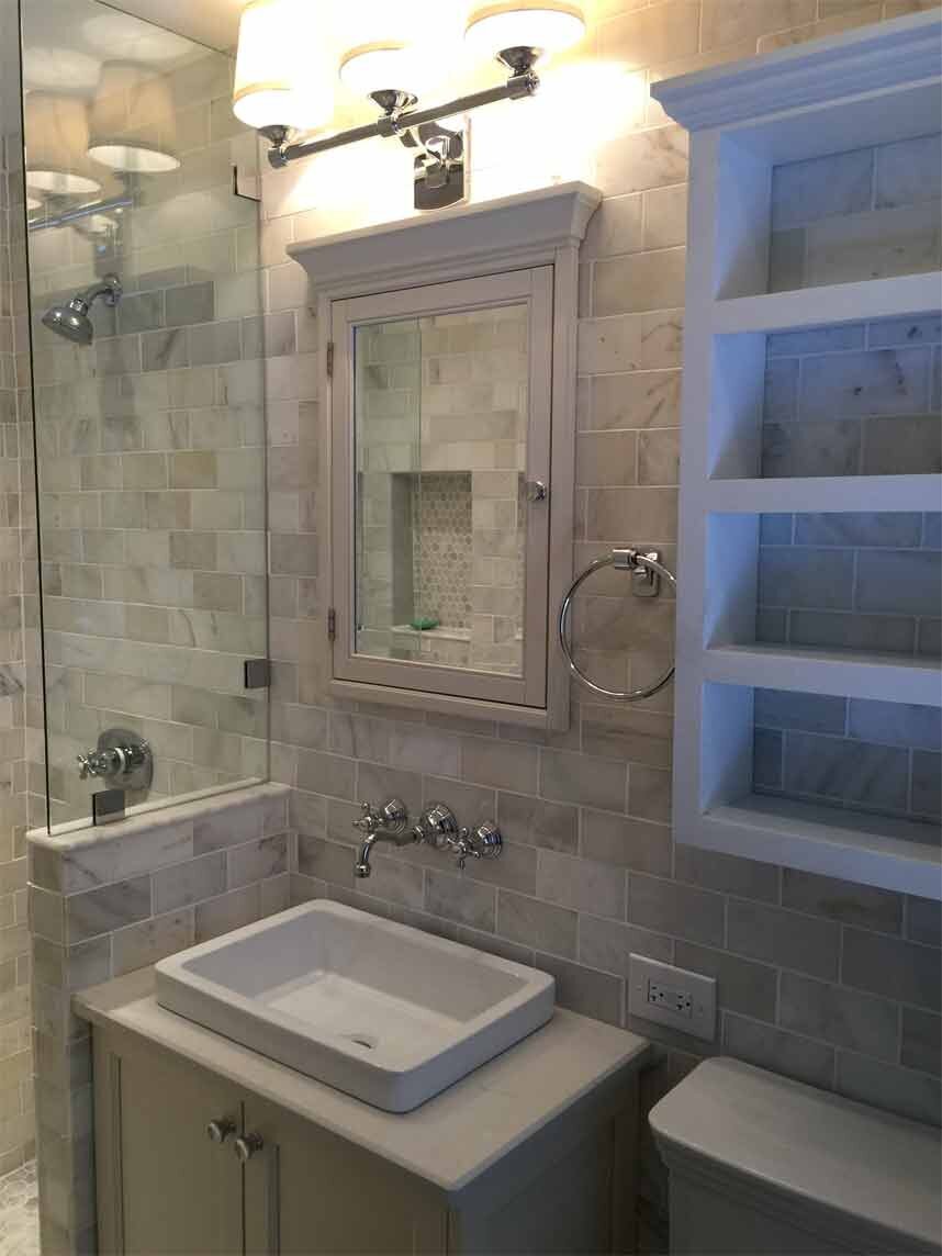 Bathroom design with grey tiles