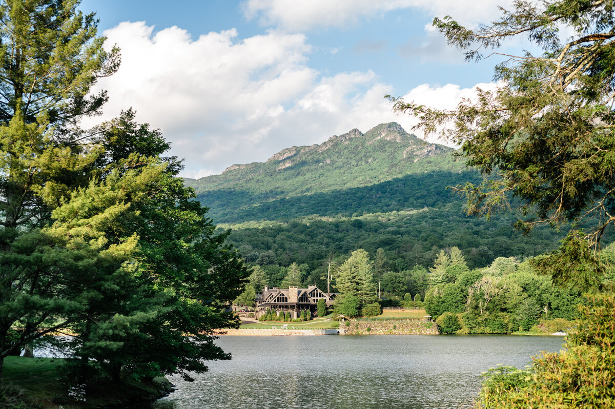 Stunning view of home, lake, and mountains in North Carolina
