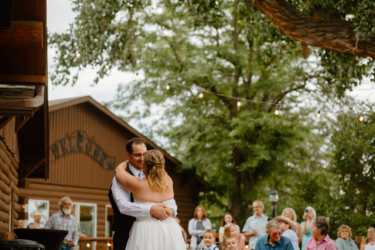 A bride and groom share their first dance at Ellis Ranch in Loveland, Colorado.