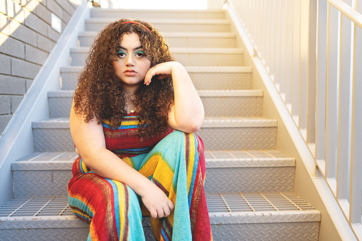 Chandler high school senior photographer girl posed on stairway curly hair golden hour @ Reaj Roberts Photography RRP_4563-2