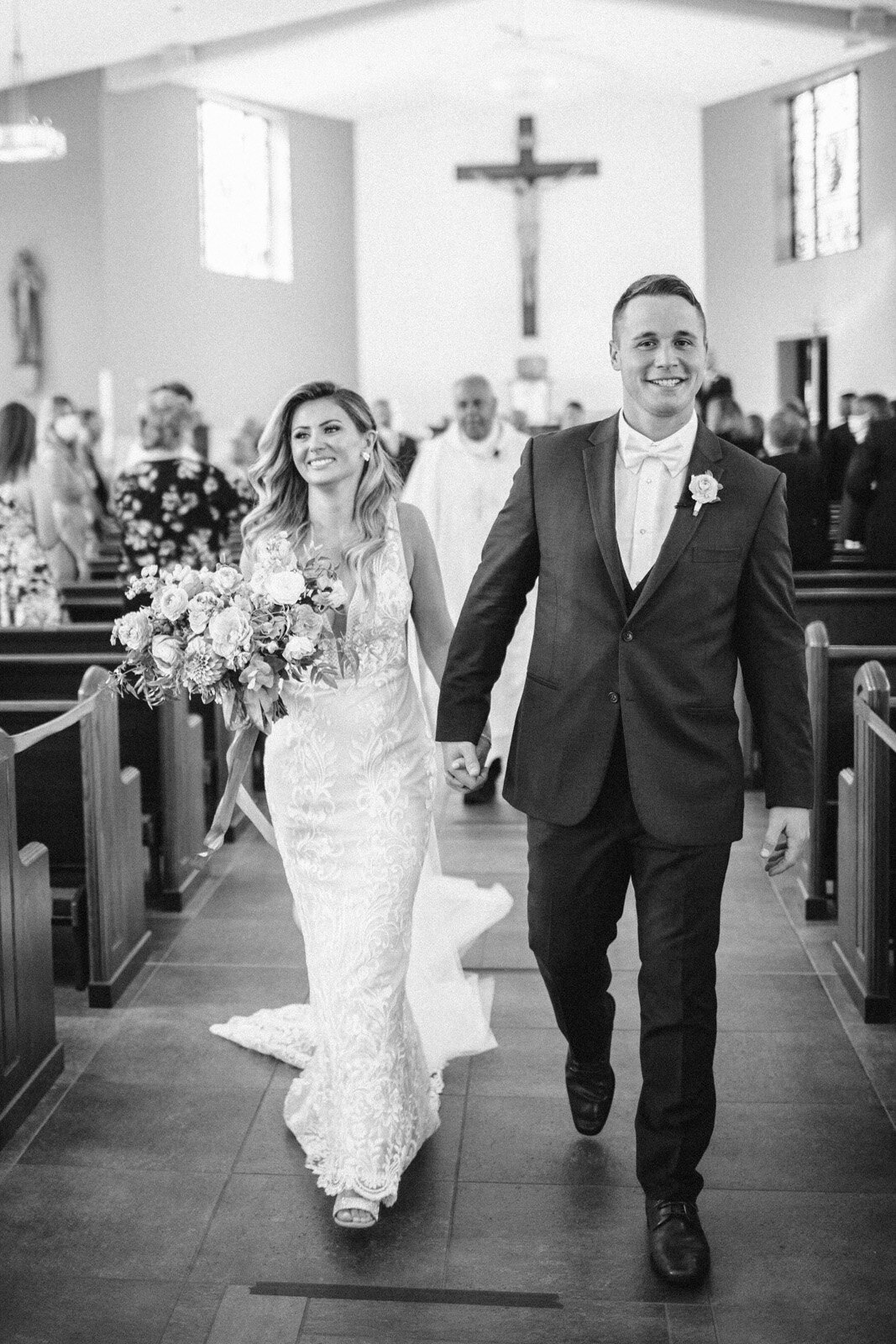 Kate-Murtaugh-Events-bride-groom-church-wedding-aisle-MA-event-planner