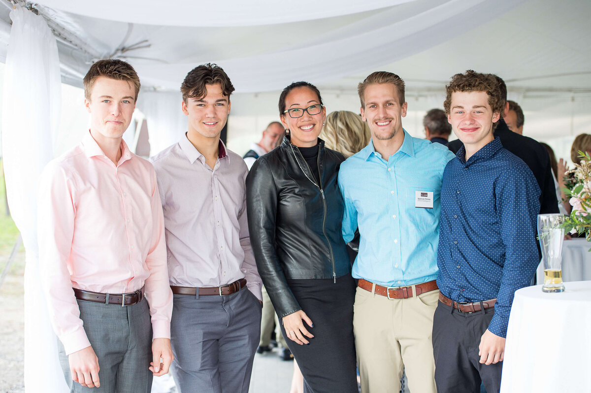 a photo of 5 smiling guests at Ell-Rod 25th Anniversary Celebration. Captured by Ottawa Event Photographer JEMMAN Photography COMMERCIAL   