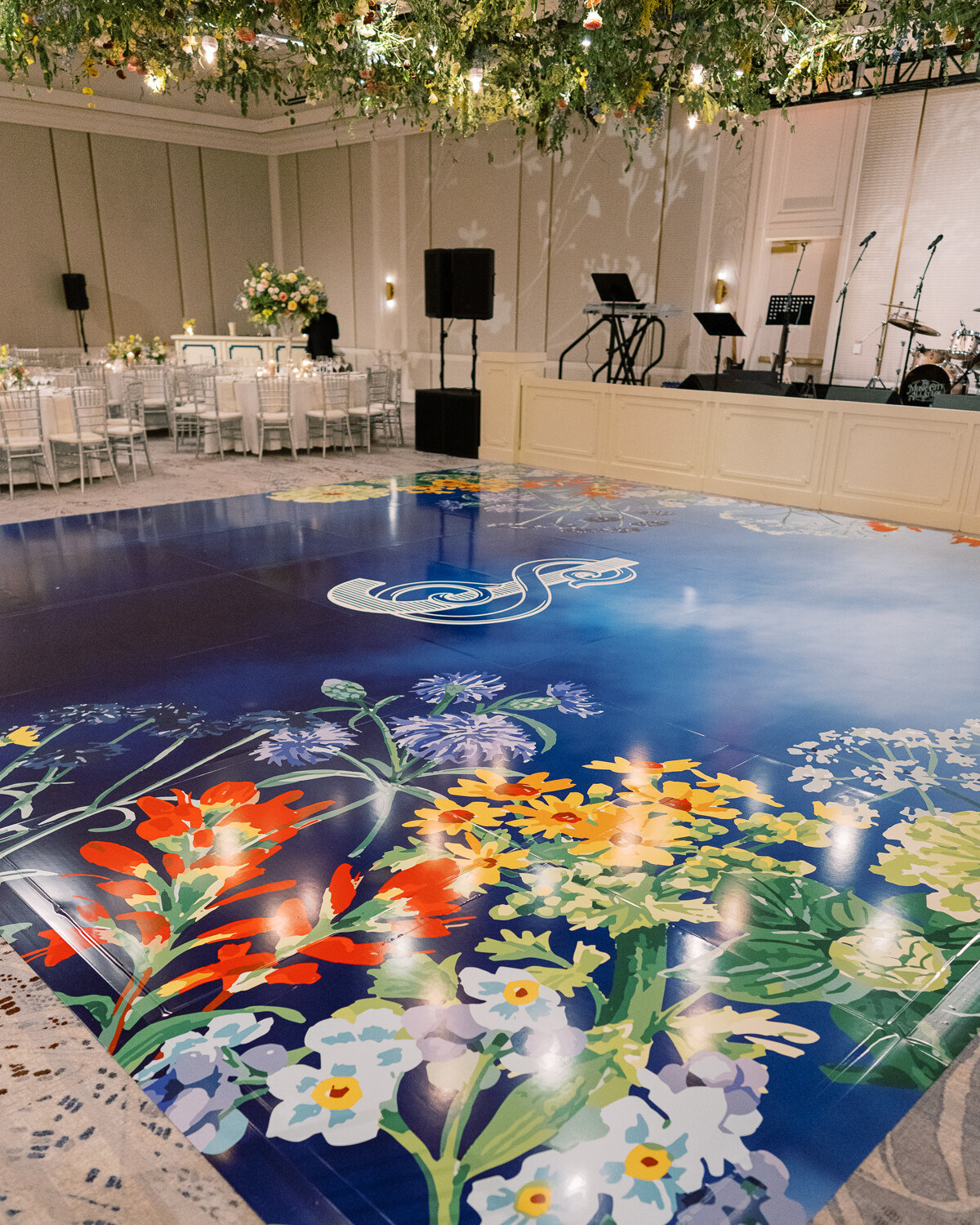 blue dance floor with wildflowers