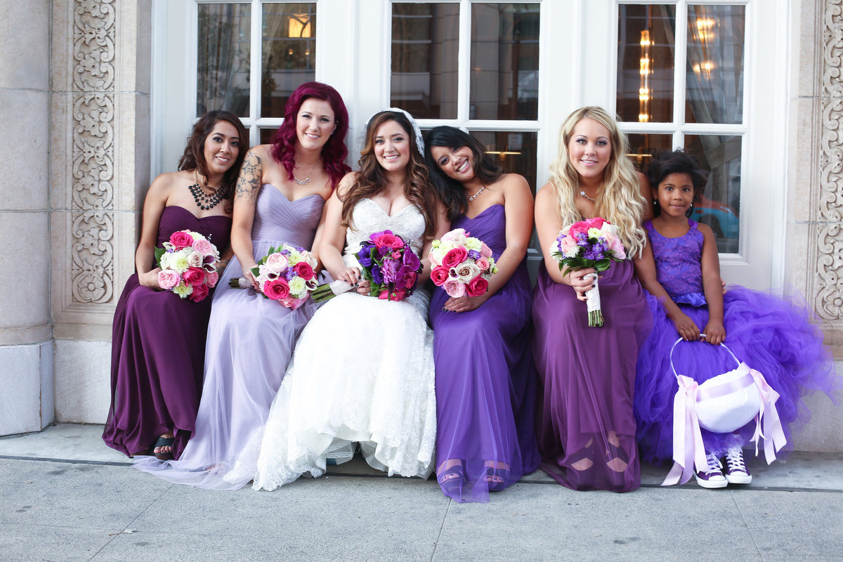 bridesmaids wearing purple