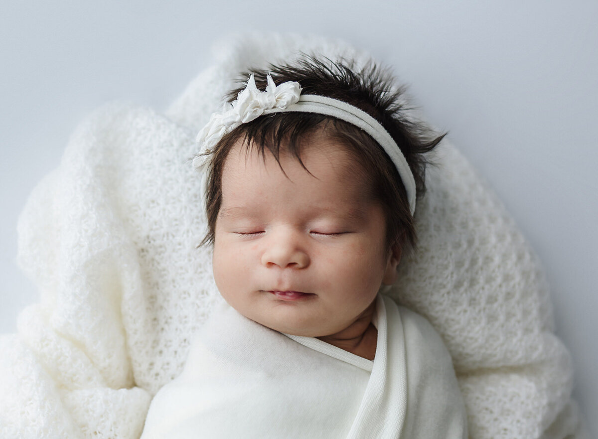 newborn-girl-in-white-navarre-florida